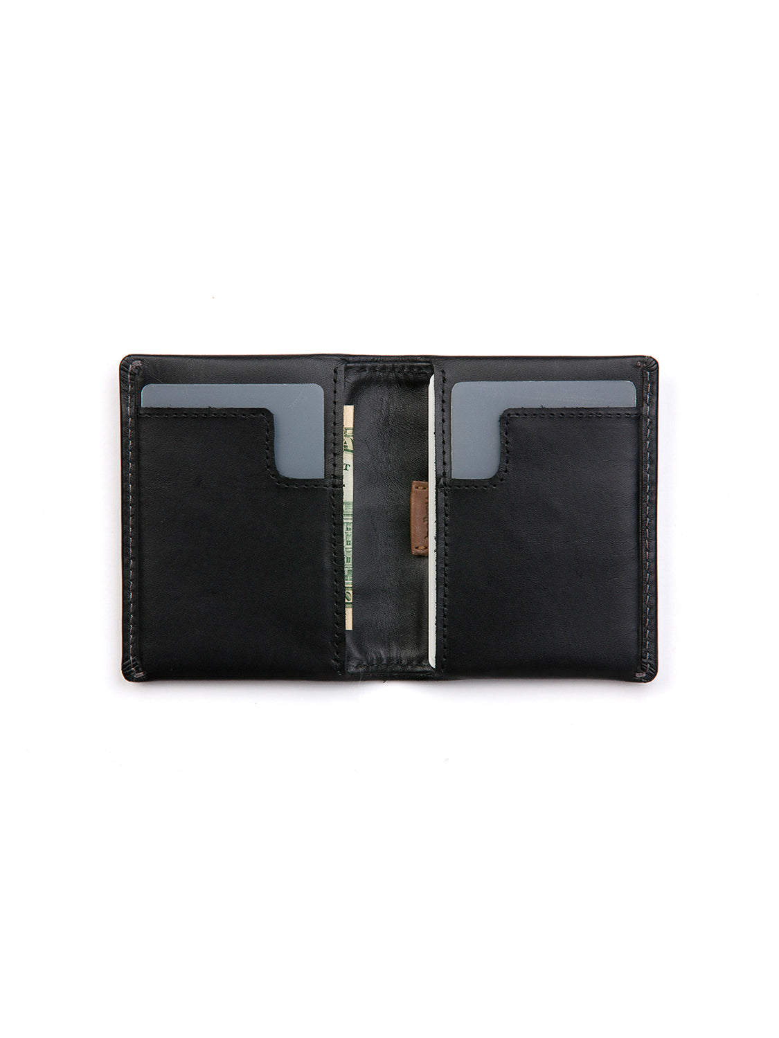 The Bellroy Slim Sleeve Wallet, in black leather, is opened to reveal two card slots per side and a center slot with a folded bill, shown against a white background.