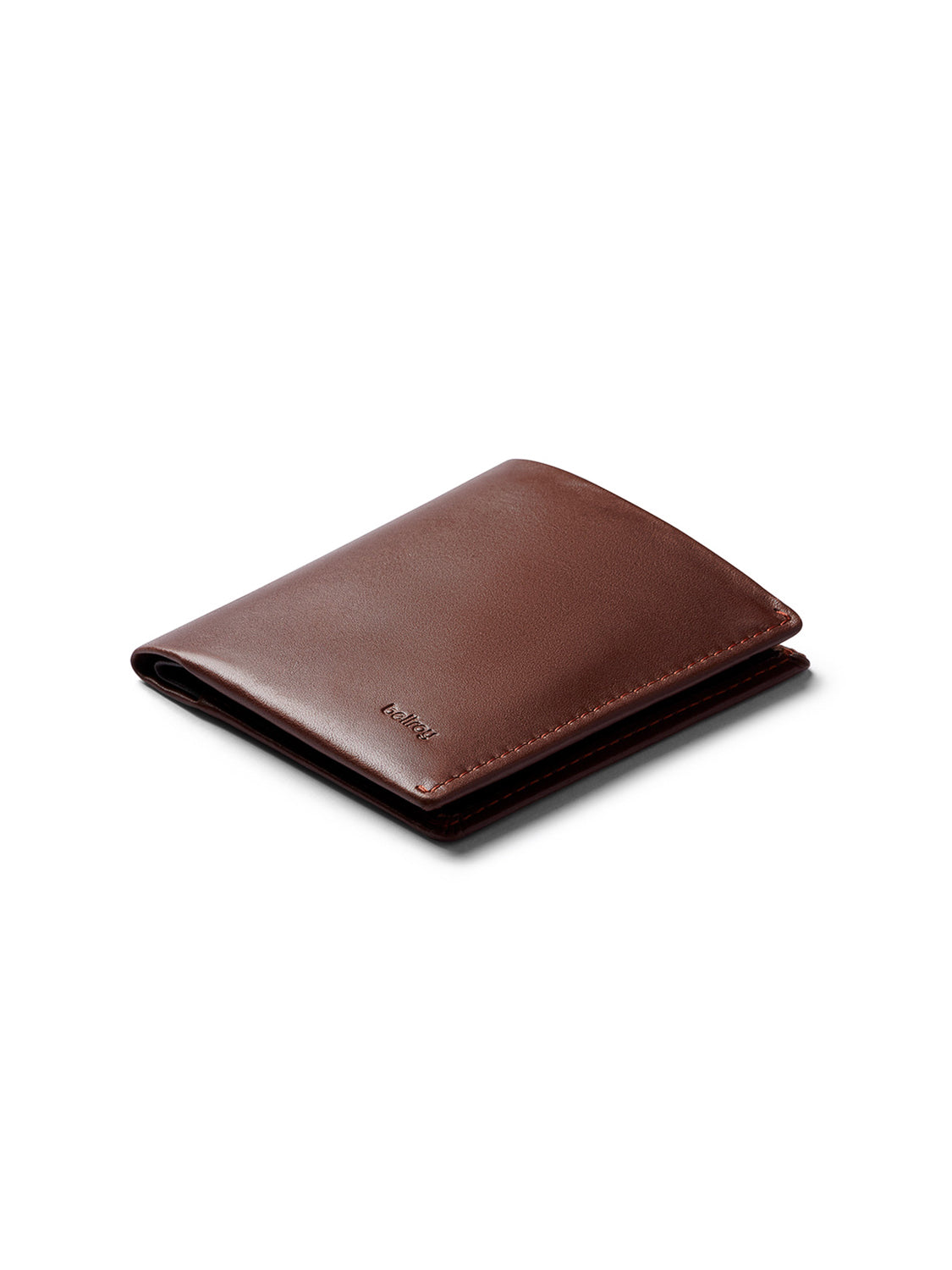 A closed, brown leather Note Sleeve Wallet by Bellroy with a smooth finish sits on a white background. The brand name "BELLROY" is embossed in small letters on the lower corner.