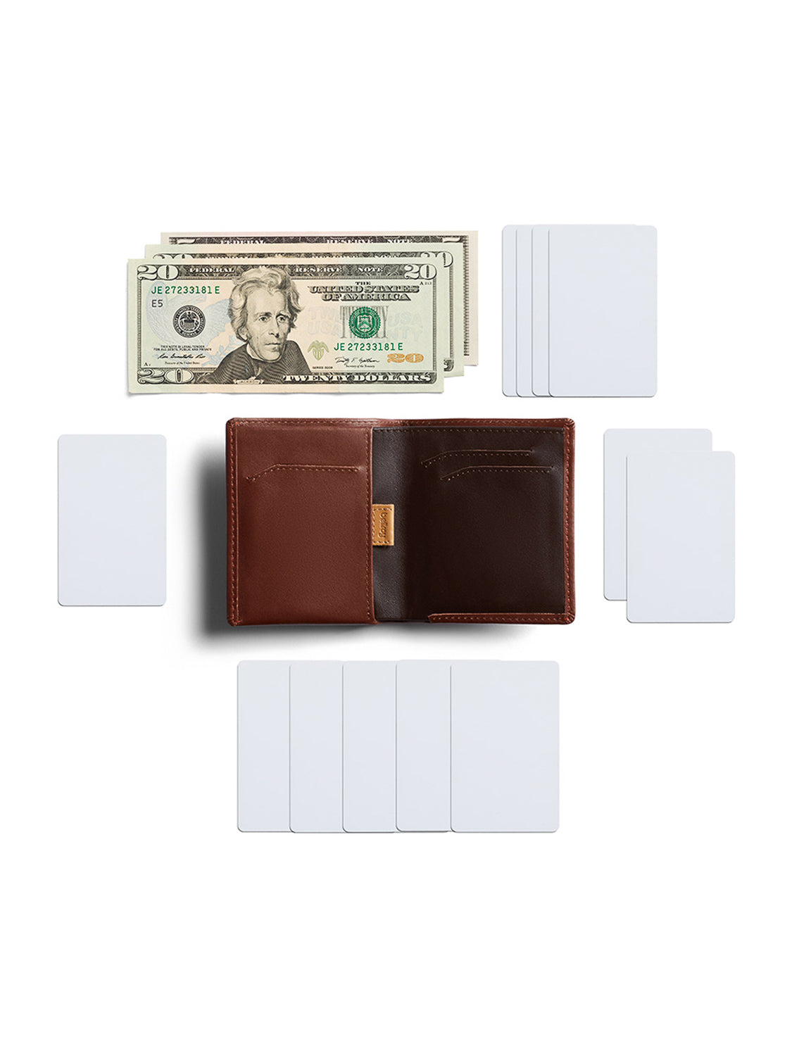 The Bellroy Note Sleeve Wallet, a brown leather slim billfold, is open on a white background with blank cards and $20 bills, highlighting its stylish design for carrying essentials.