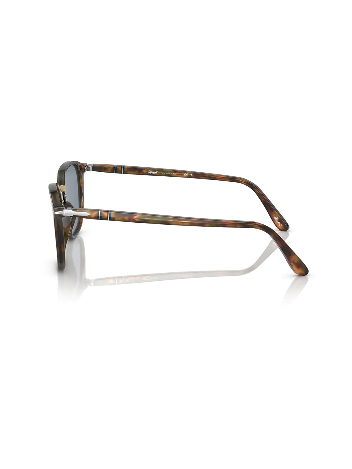 Side view of Persol - PO3186 sunglasses with tortoiseshell acetate frames and dark crystal lenses. The Meflecto system offers a comfortable fit. Positioned upright, the glasses slightly reflect on the shiny white surface beneath.