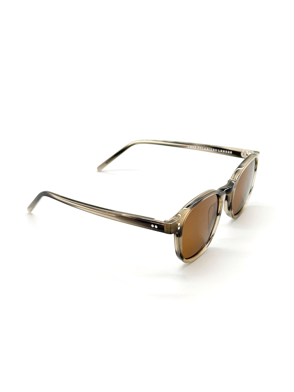 The A144C36B ID Polarized Sunglasses by ID Menswear feature brown lenses, translucent brown Mazzucchelli Acetate frames, and UV400 protection, displayed on a white background at a three-quarter angle.