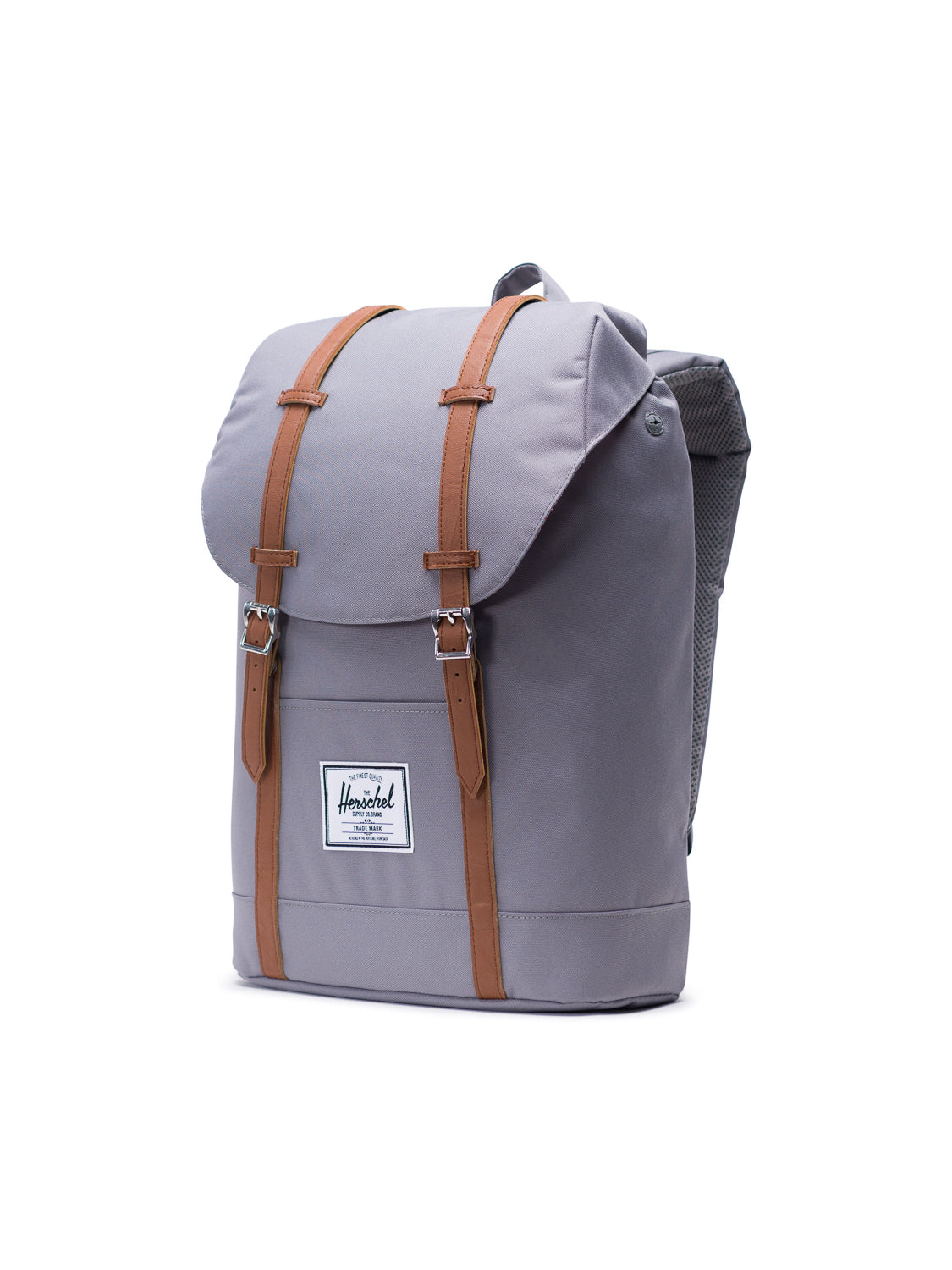 A gray Herschel Retreat Backpack with brown faux-leather straps, a top flap closure, and a white rectangular Herschel label on the front, shown against a white background.