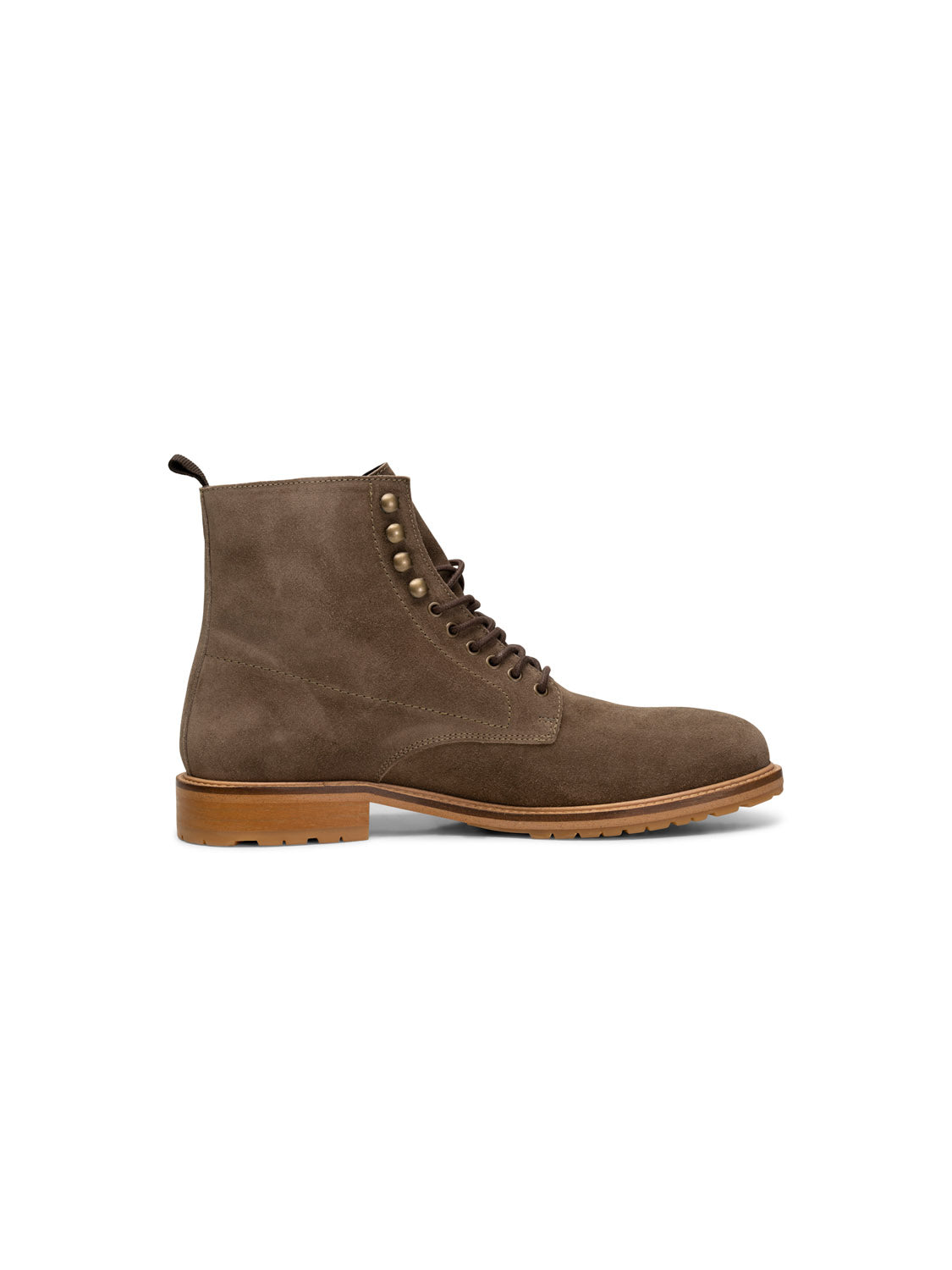 The York Suede Lace Up Boot by Shoe The Bear is a handcrafted brown suede boot from Portugal featuring metal eyelets, a wooden sole, side view prominence, a back pull tab, and deep tread on the outsole for rugged terrain.