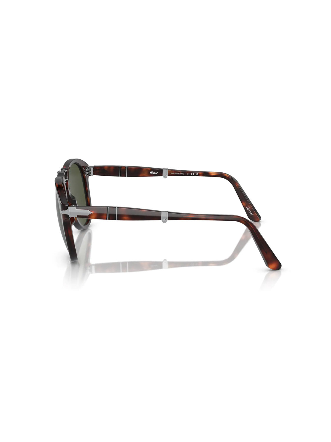 Side view of Persol - PO714 tortoiseshell sunglasses with silver accents and dark lenses on a white background. The acetate frame has sleek arms that enhance the pattern, and these folding glasses offer convenience and style.