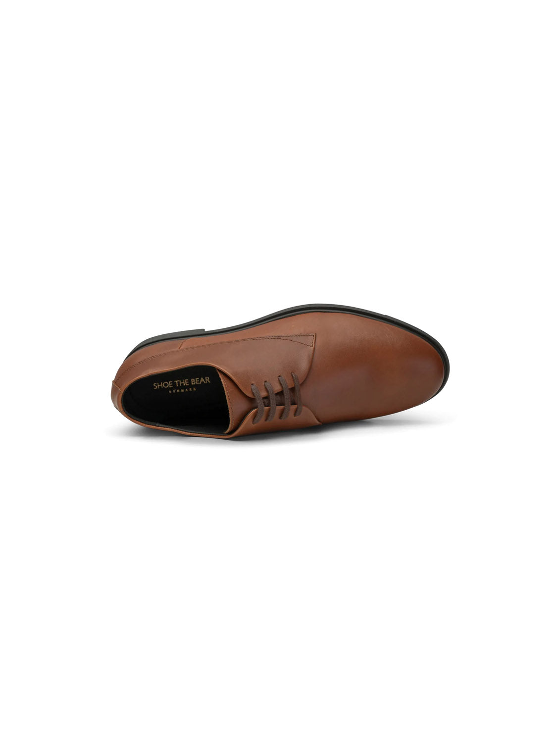 The Linea Derby Style from Shoe The Bear features brown LWG-certified leather with a sleek design, black recycled rubber sole, and minimalist stitching, showcasing its elegant craftsmanship when viewed from the side and slightly above.