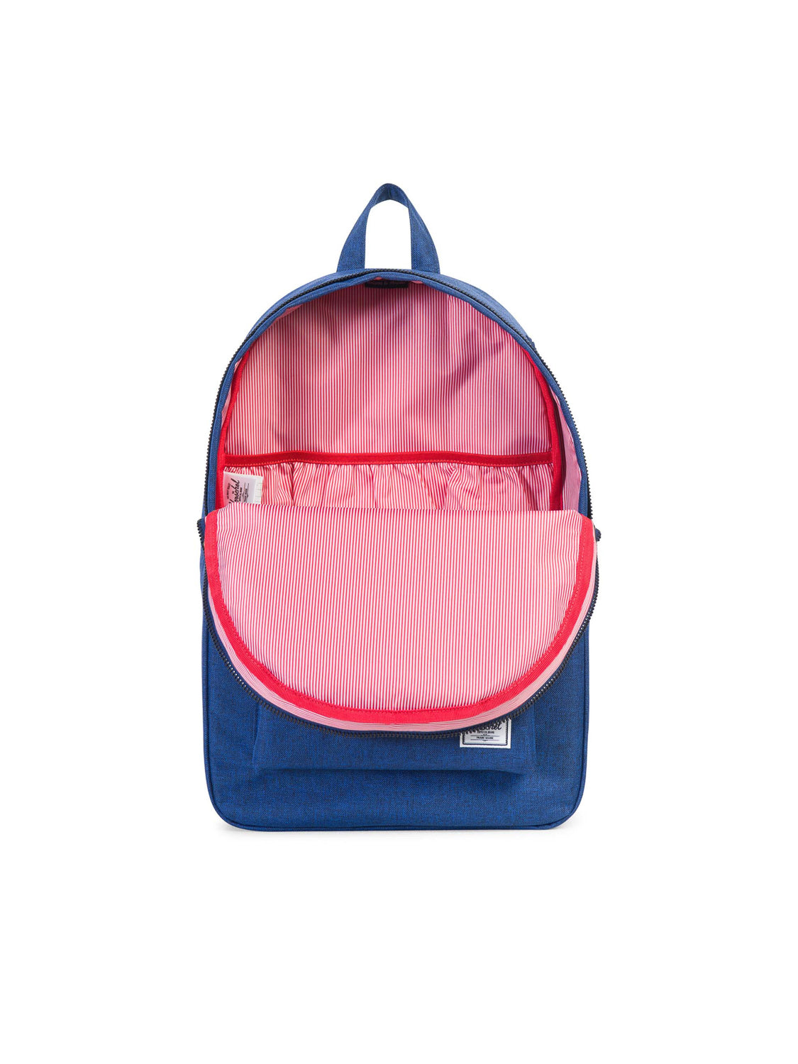 The Herschel Settlement Backpack is shown upright on a white background in blue, with a zippered front, pink-and-white striped lining, inner pocket, and dedicated laptop sleeve.