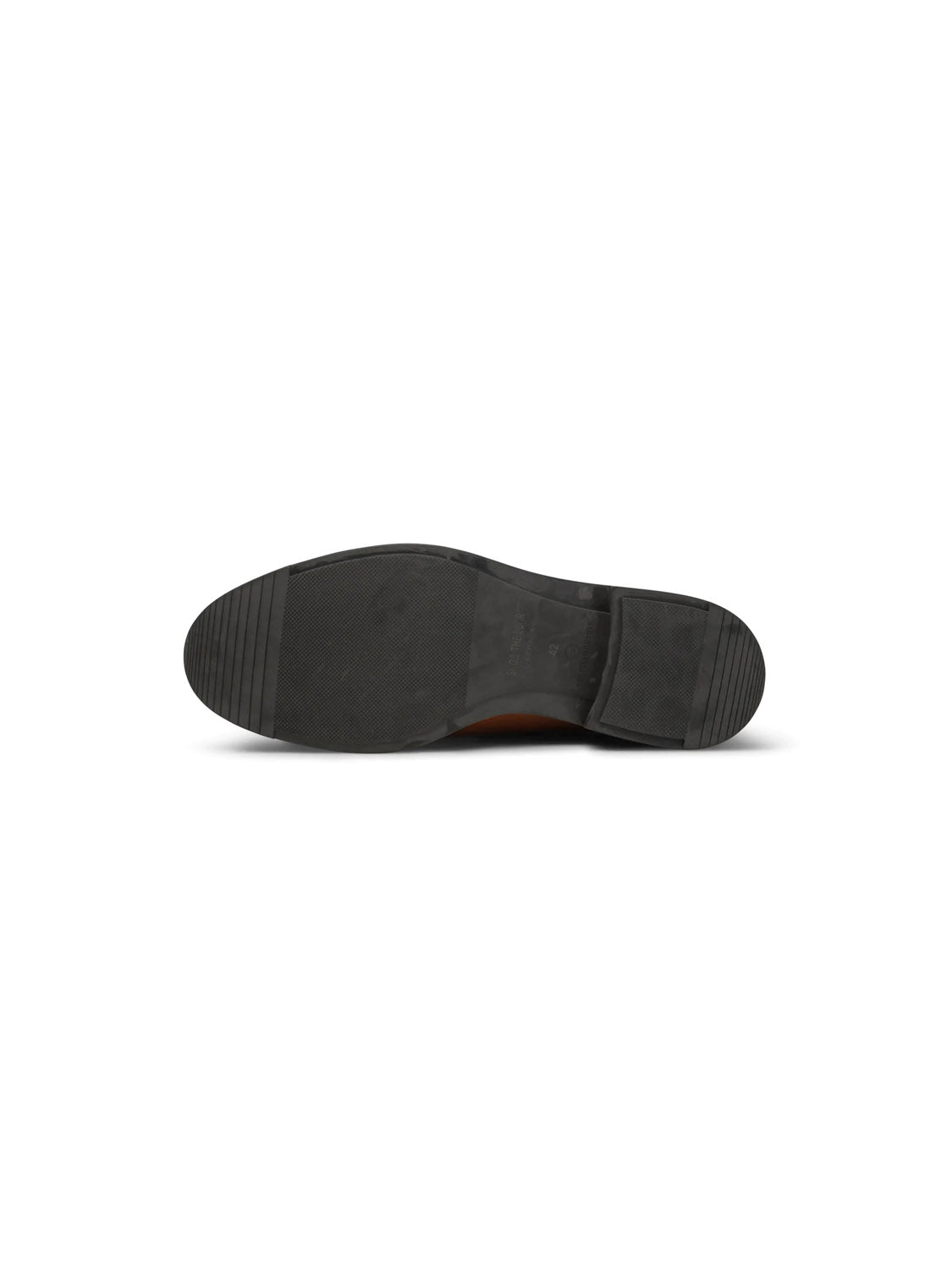 The image displays the black sole of the Shoe The Bear Linea Derby Style shoe from a bottom view on a white background. Made from recycled rubber, it includes a slightly raised heel, grooves, and a smooth central area.