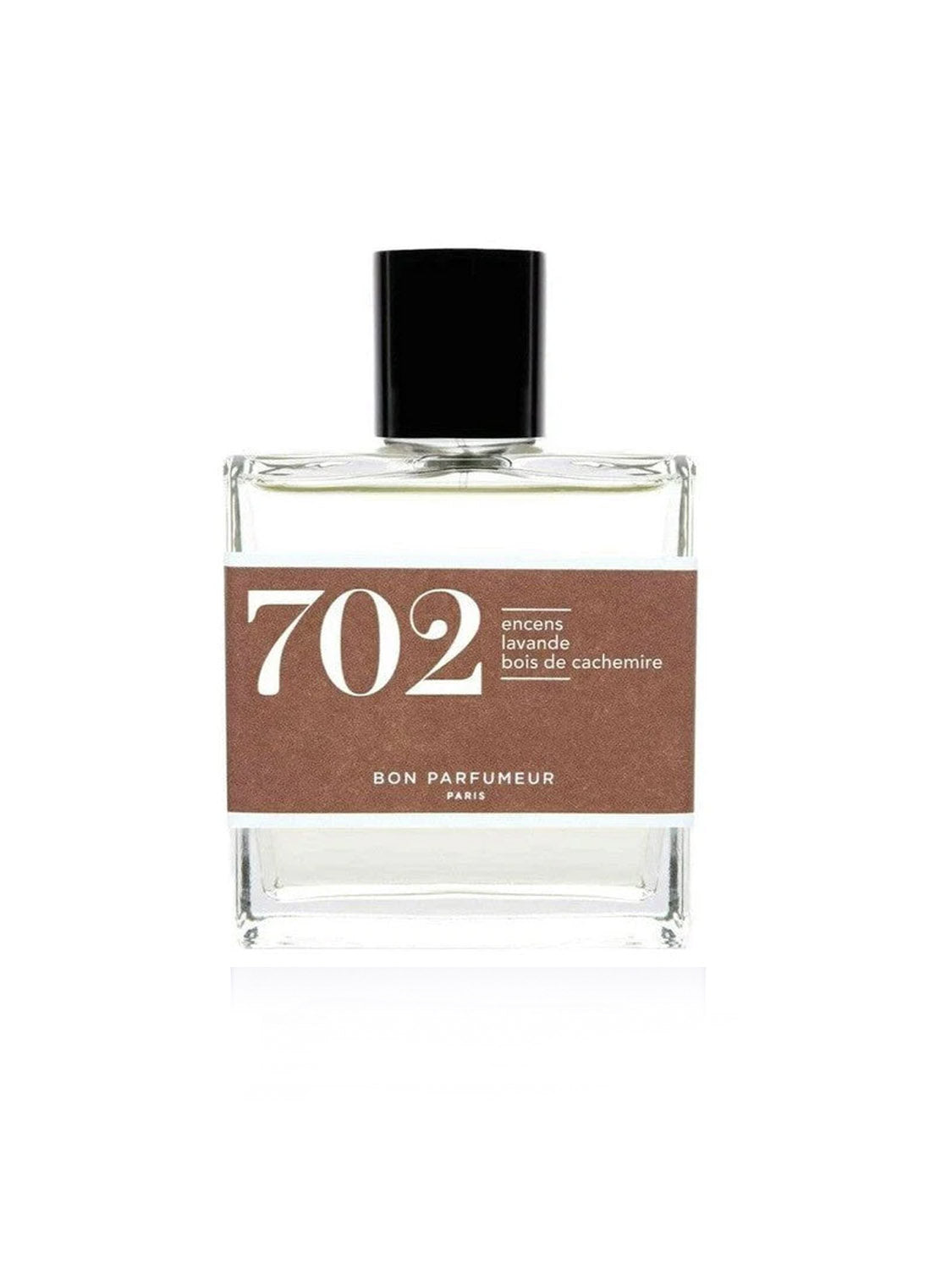 A clear glass bottle with a black cap and brown label reading "702 encens lavande bois de cachemire" by Bon Parfumeur. This woody aromatic fragrance is cruelty-free, shown against a white background. Product: Bon Parfumeur - 702.