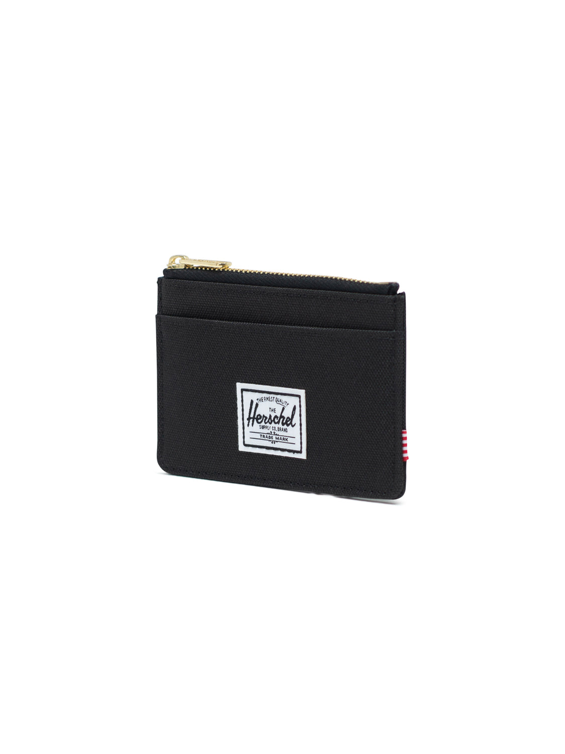 The Herschel Oscar Compact Wallet is a black zippered card holder featuring a white rectangular Herschel label on the front, displayed at an angle against a plain white background. Perfect for carrying everyday essentials in style.