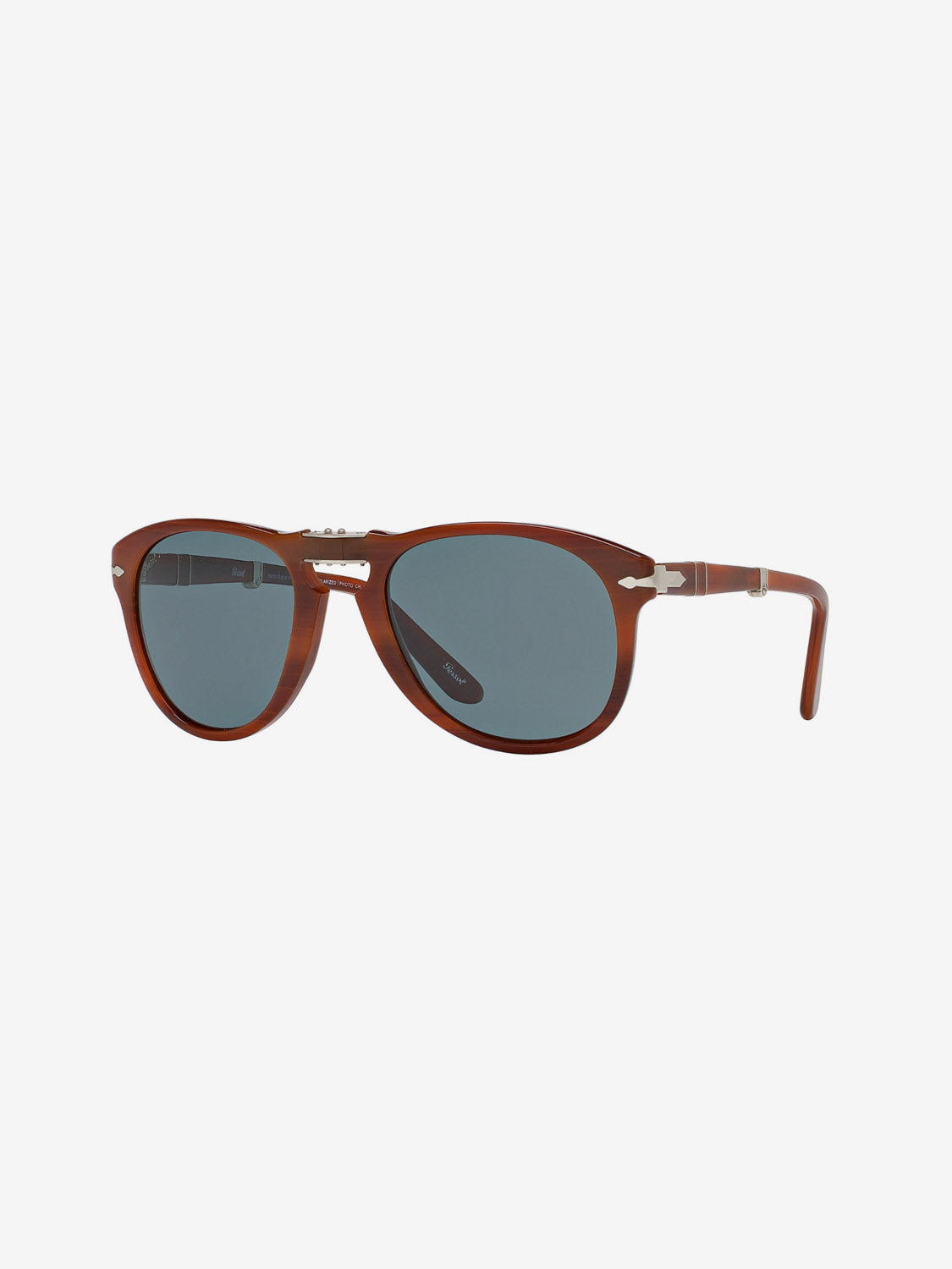 The Persol PO714 sunglasses by Persol feature a rounded brown acetate frame with blue-tinted lenses and silver hinge accents, made in Italy and displayed on a white background.