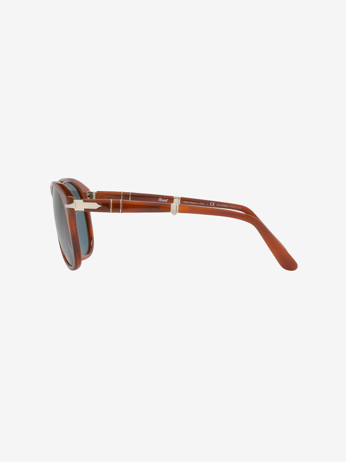 The Persol PO714 sunglasses feature a brown acetate frame with round dark lenses and metallic gold accents near the hinges, showcased from the side on a white background. Wide, gently curved temples add to their sleek look.