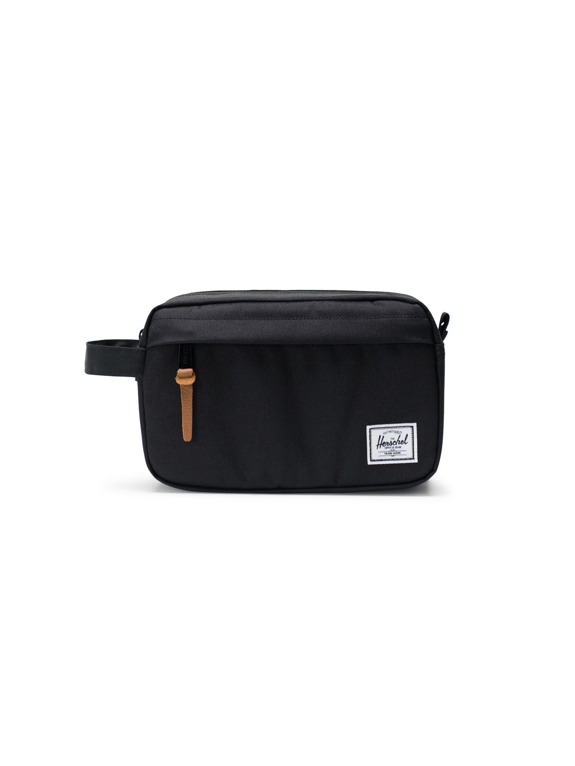 The Herschel Chapter Travel Kit is a rectangular black toiletry organizer with a waterproof zipper, brown leather pull, side handle, and a white Herschel logo patch on the front, shown against a white background.