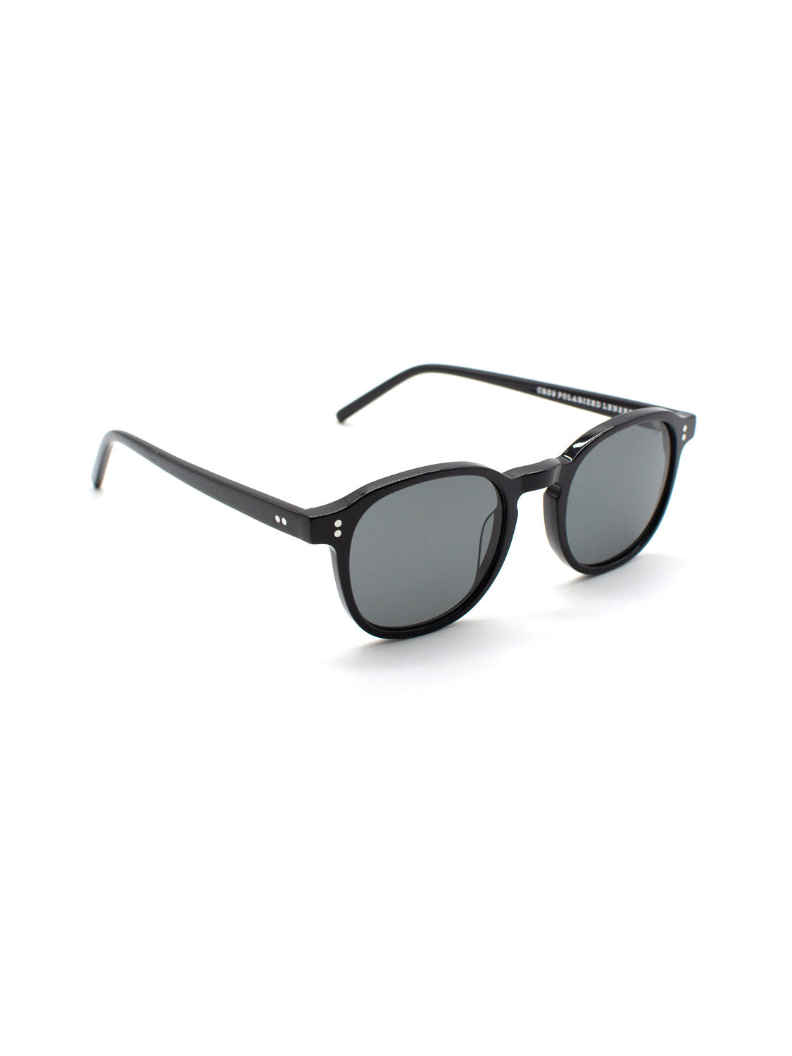 The A144C1G ID Polarized Sunglasses by ID Menswear feature black round frames, CR39 polarized lenses with UV400 protection, thin arms, and small silver hinge accents, shown against a white background.