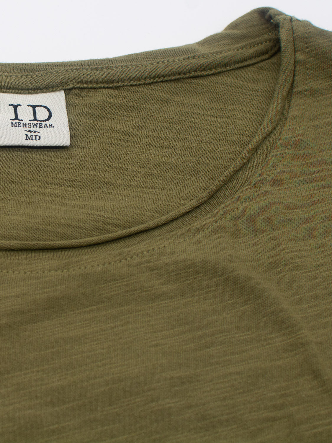 Close-up of a Da Nang Rolled Neck Slub Tee in olive green on a white background. A label on the rolled neck reads ID Menswear.