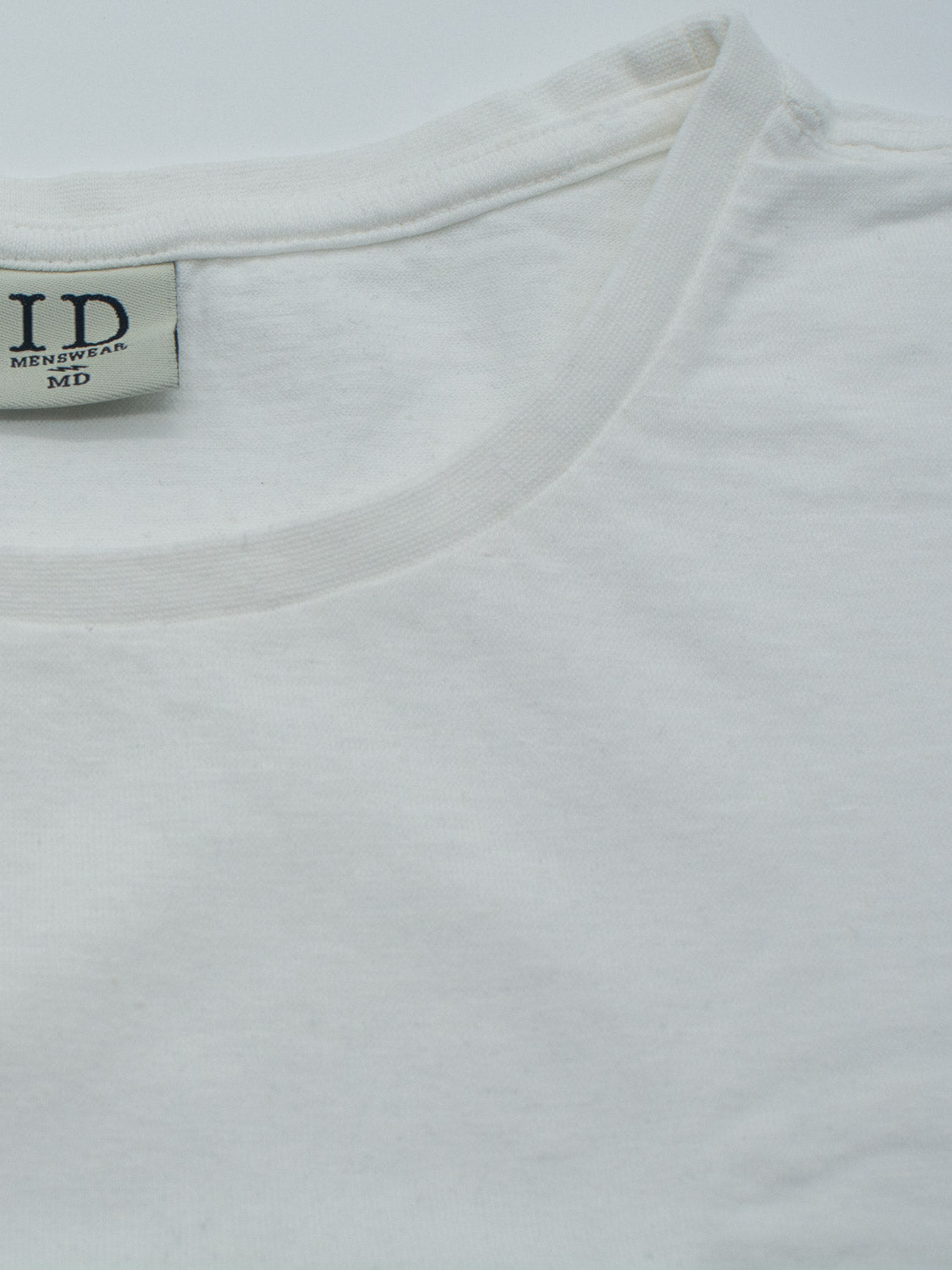 Close-up of the Dope Hemp Organic Cotton Tee by ID Menswear in size MD, showcasing a round neckline. The shirt is crafted from a soft and slightly textured organic cotton blend for comfort and sustainability.