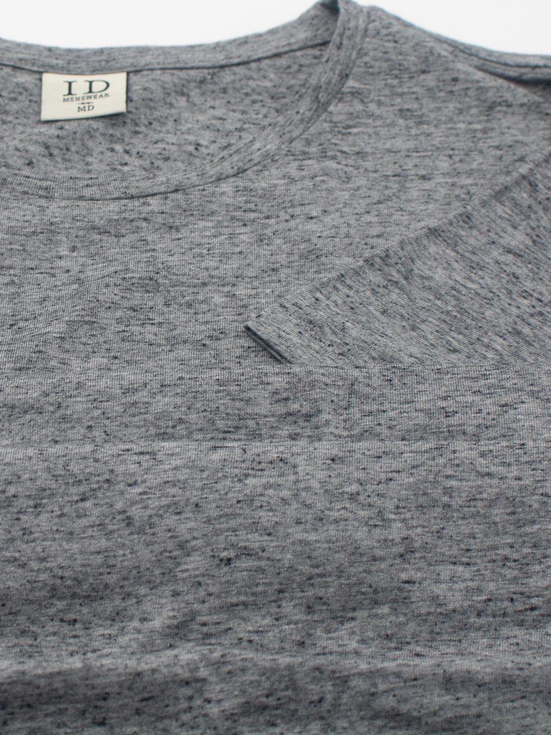 The Outclass Speckled Crew Neck Tee by ID Menswear, in gray heather with a left chest pocket, is made from soft cotton/poly jersey. Featuring a subtle speckled texture and an ID collar label, its perfect for everyday wear in size medium.