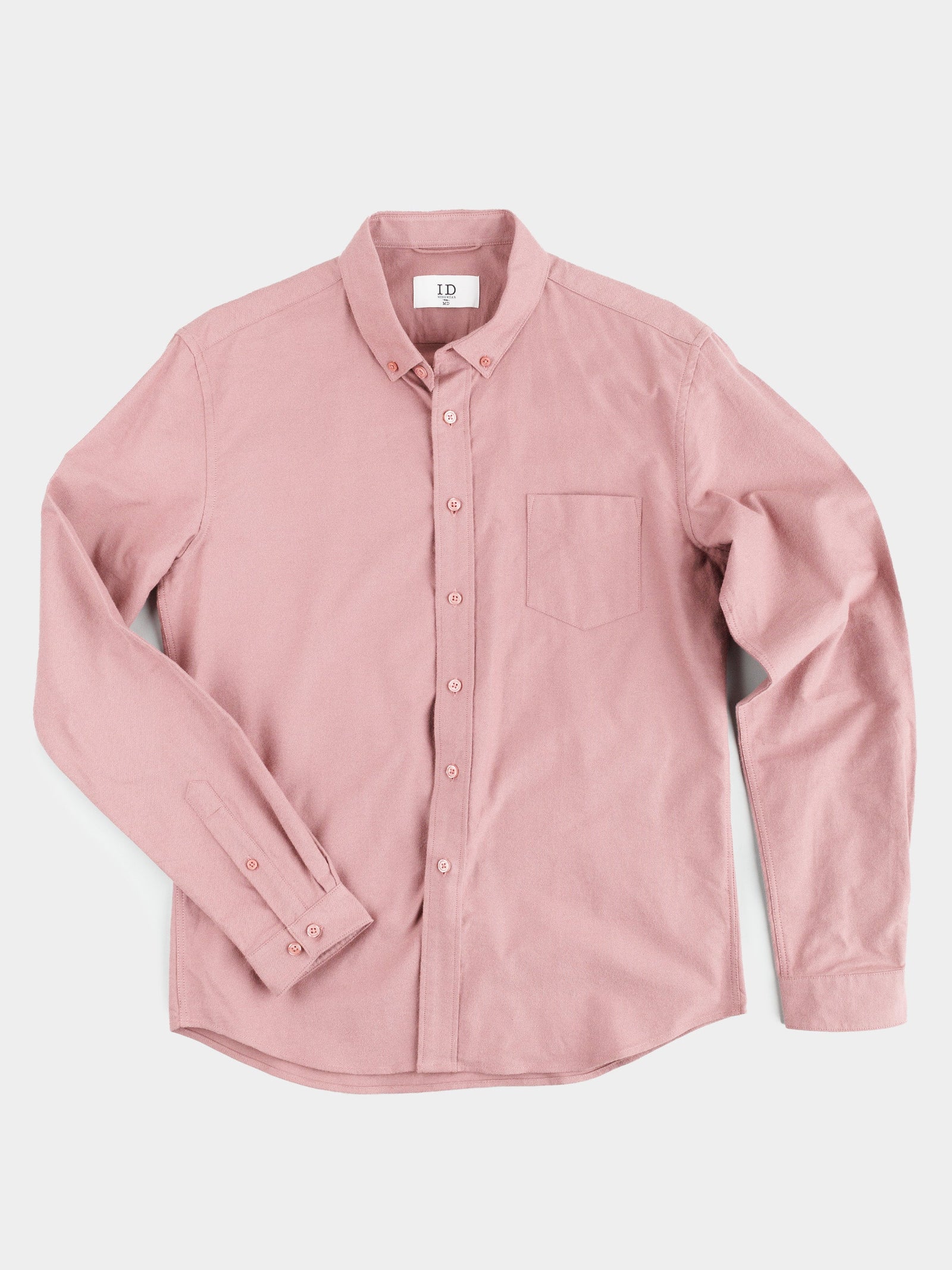 The Milo Brushed Oxford Flannel Cotton Shirt by ID Menswear, a pink long-sleeve with a front pocket, is neatly arranged on a light background.