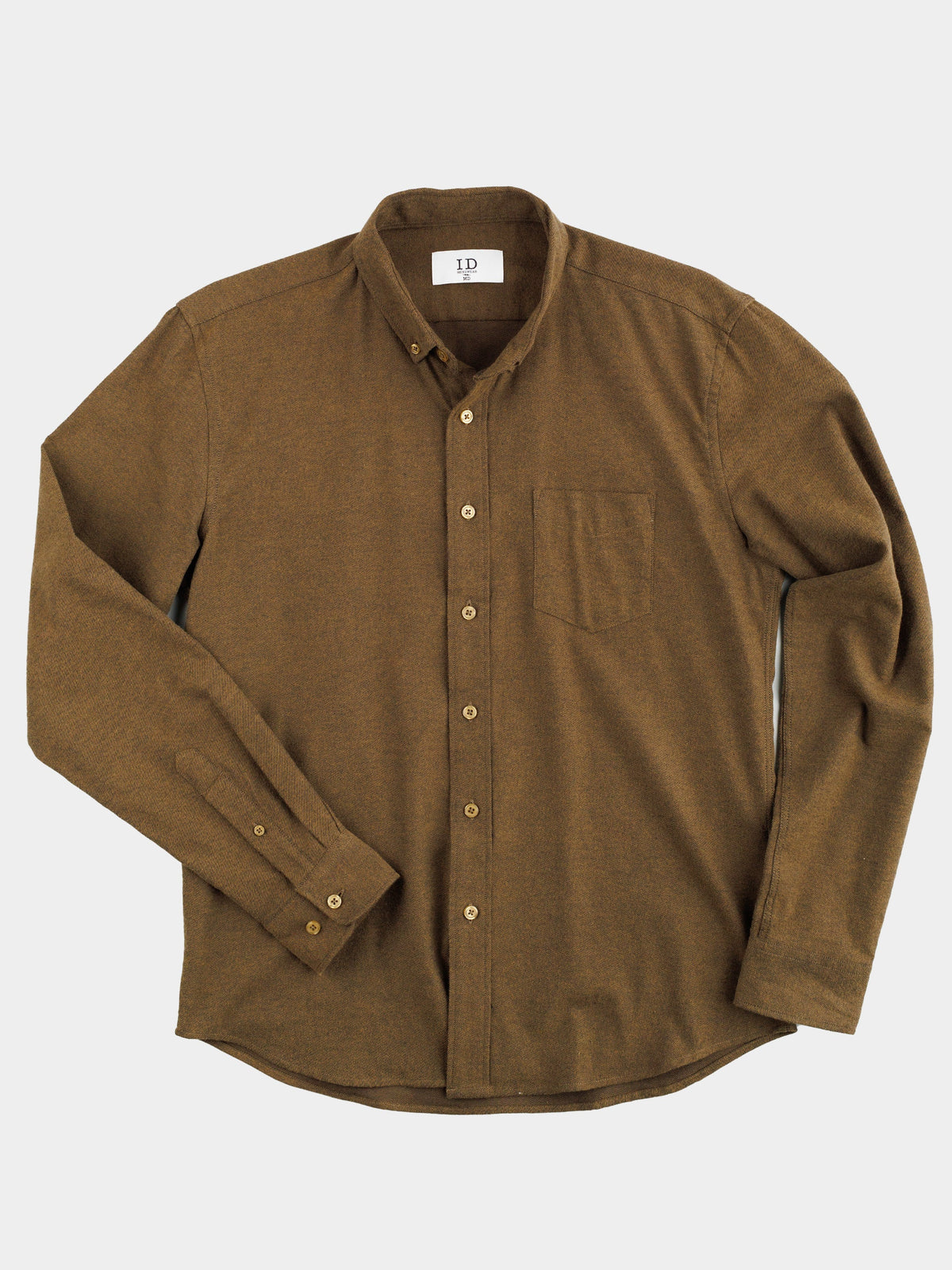 The Magnus Brushed Twill Solid Flannel Shirt by ID Menswear, featuring long sleeves, a button-down collar, and front pocket, is shown flat on a white background.