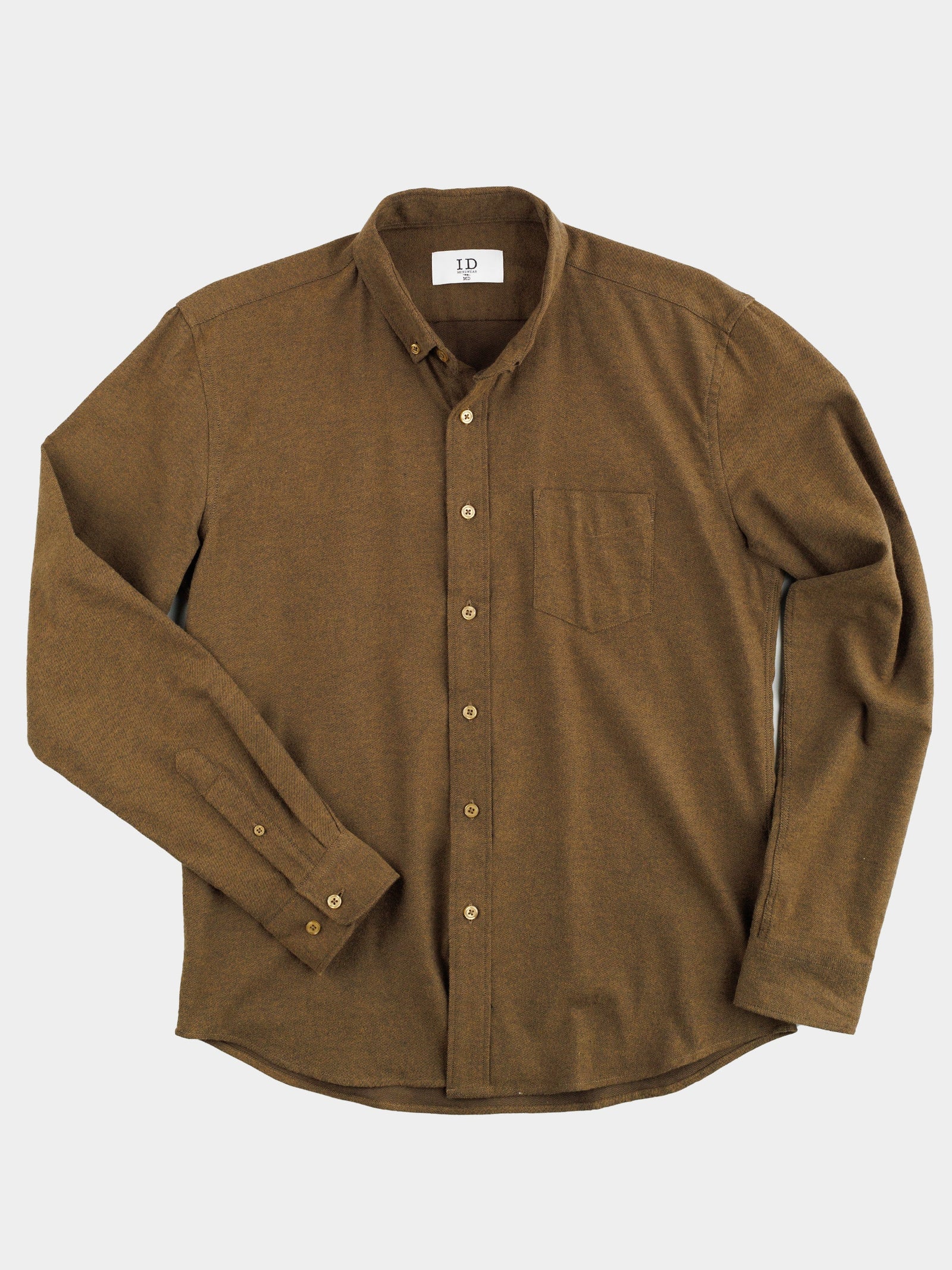 The Magnus Brushed Twill Solid Flannel Shirt by ID Menswear, featuring long sleeves, a button-down collar, and front pocket, is shown flat on a white background.