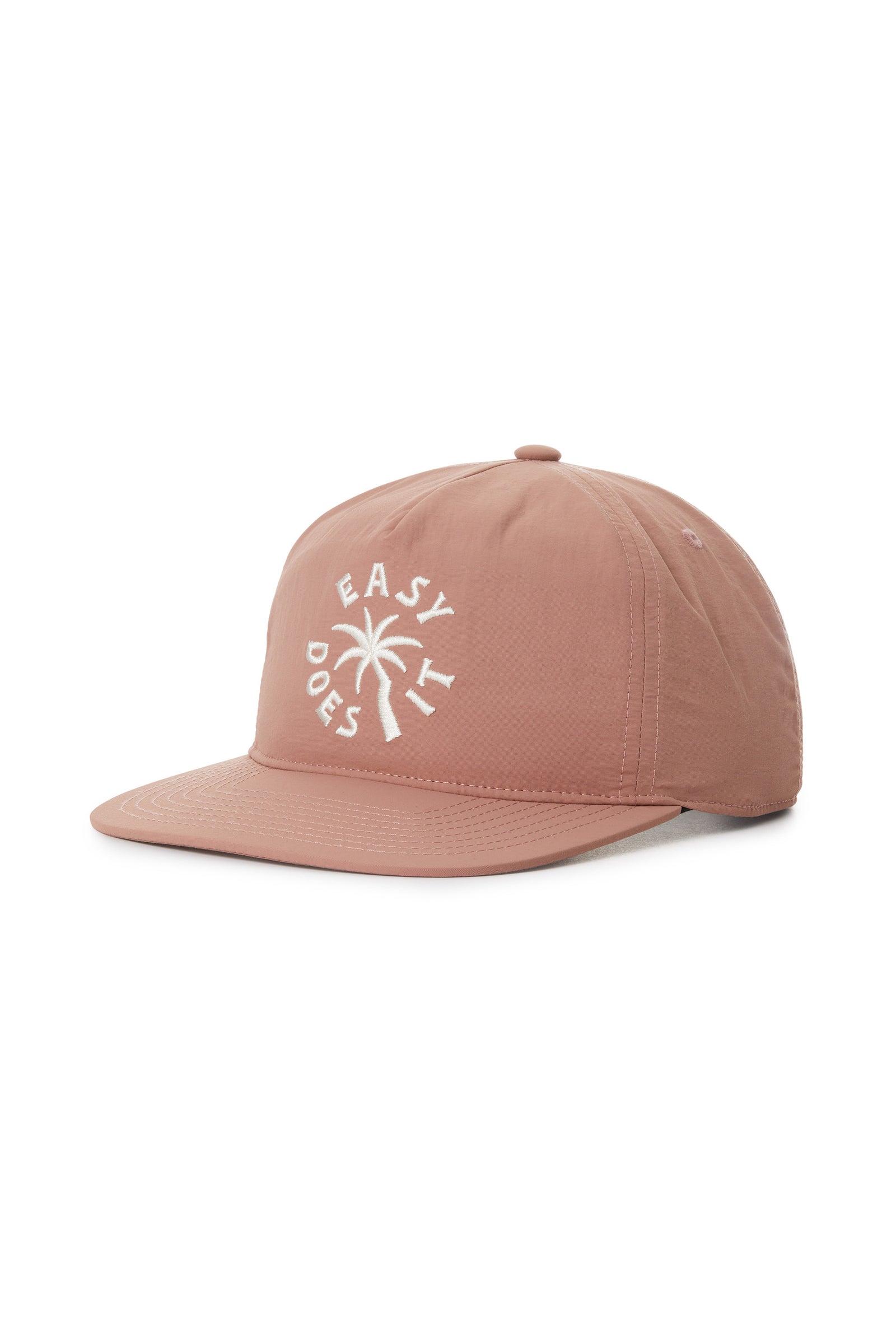 The Katin Easy Palm Hat is a light brown nylon 5-panel cap with custom embroidery: white "EASY DOES IT" text arched around a small palm tree graphic on the front.