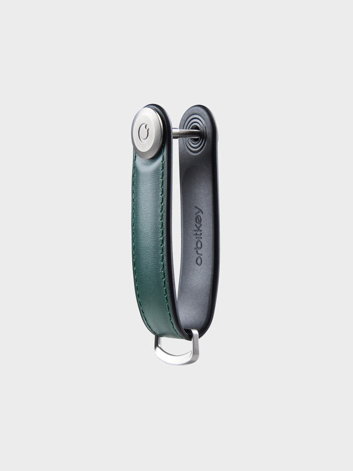 The Orbitkeys Key Organizer Hybrid Leather features a green Nappa leather strap, metal hardware, and secure locking to hold keys neatly. The inner black surface is embossed with the Orbitkeys brand name.