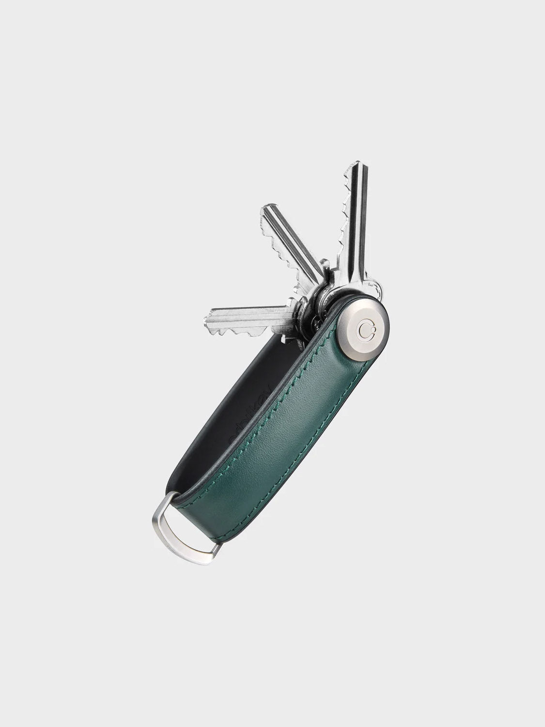 The Orbitkeys Key Organizer Hybrid Leather in green Nappa leather features a secure locking mechanism, holds multiple silver keys, and has a metal loop, shown on a light gray background.
