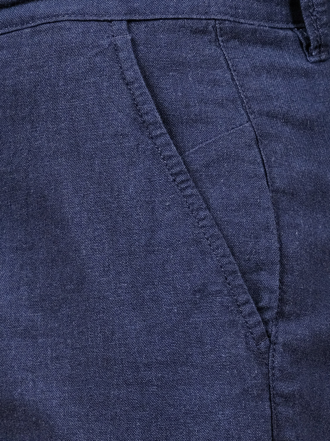 Close-up of the !Solid Aurelius Short in navy blue, showcasing the side pocket, seam details, and textured fabric with visible stitching for a refined look.
