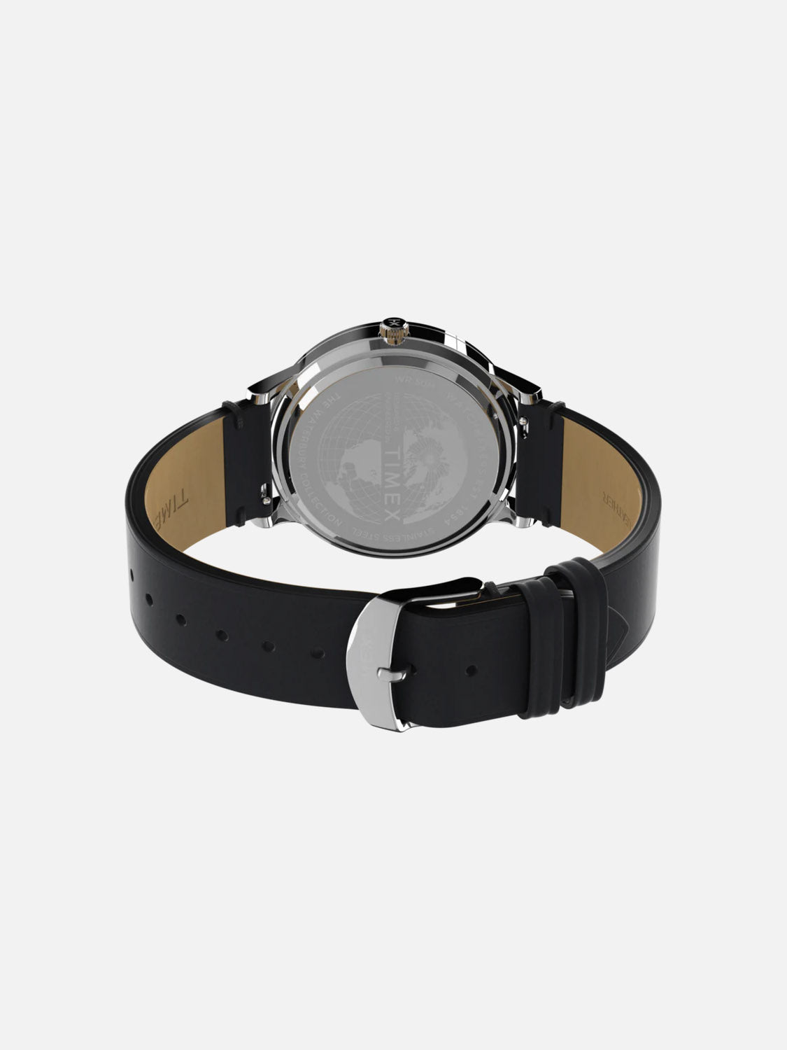 The image shows the back view of the Timex Waterbury Classic, featuring a stainless steel case, black quick release leather strap, and silver buckle. The Timex brand is faintly marked on the silver back cover.