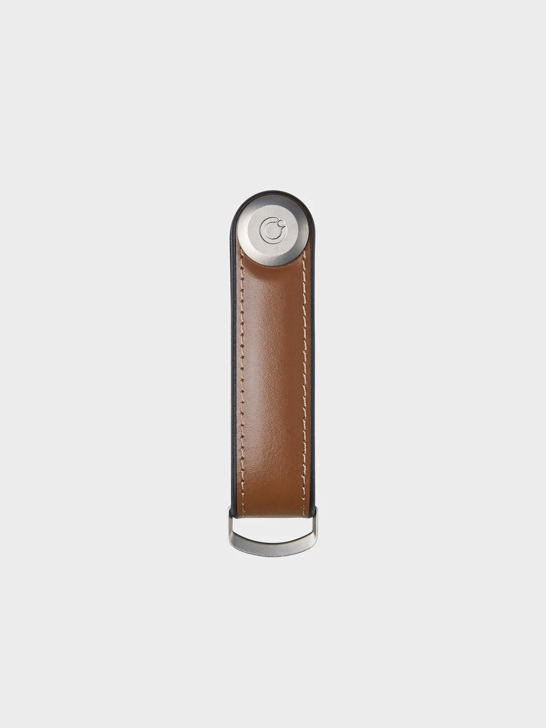 The Orbitkeys Key Organizer Hybrid Leather features white-stitched Nappa leather, a round metallic top button, secure locking mechanism, and a metal bottom loop, presented against a plain light background.