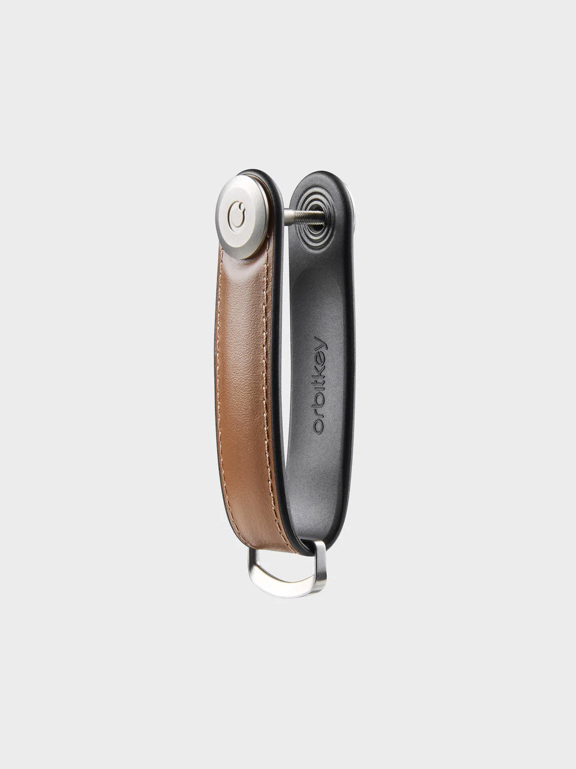 The Orbitkeys Key Organizer Hybrid Leather in brown and black Nappa leather features a secure locking mechanism, silver hardware, and a compact, foldable design to stylishly hold multiple keys.