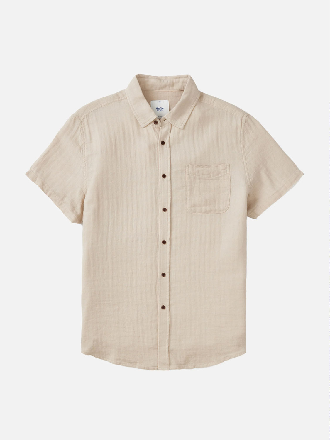The Katin Alan Solid Shirt by Katin features a single chest pocket, flat collar, and brown buttons. This short-sleeve button-up offers versatile style and high-quality material, shown on a plain white background.
