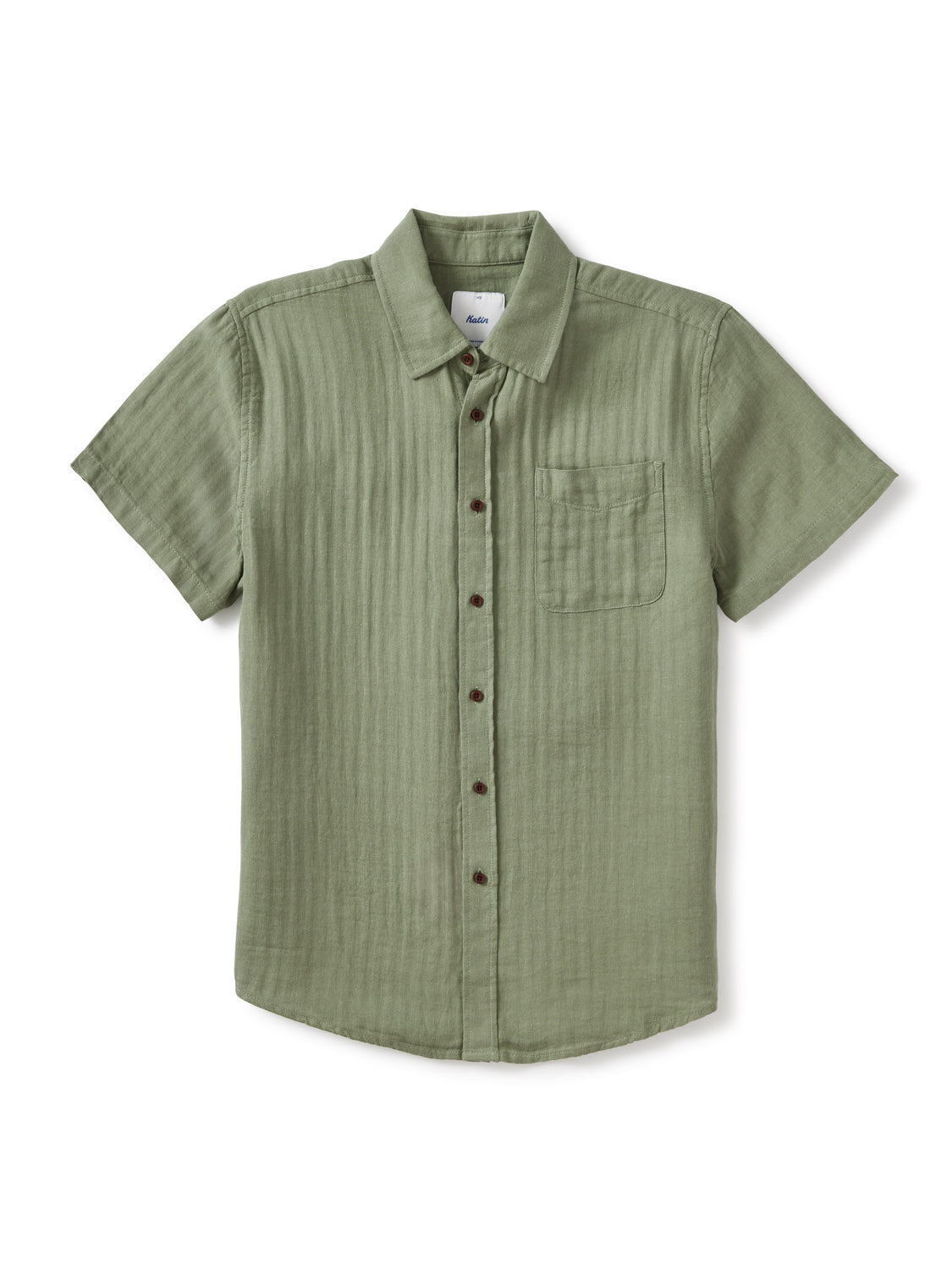 The Katin Alan Solid Shirt by Katin is a light olive green short-sleeve button-up, featuring a single chest pocket and crafted from premium materials, shown laid flat on a white background for a versatile look.
