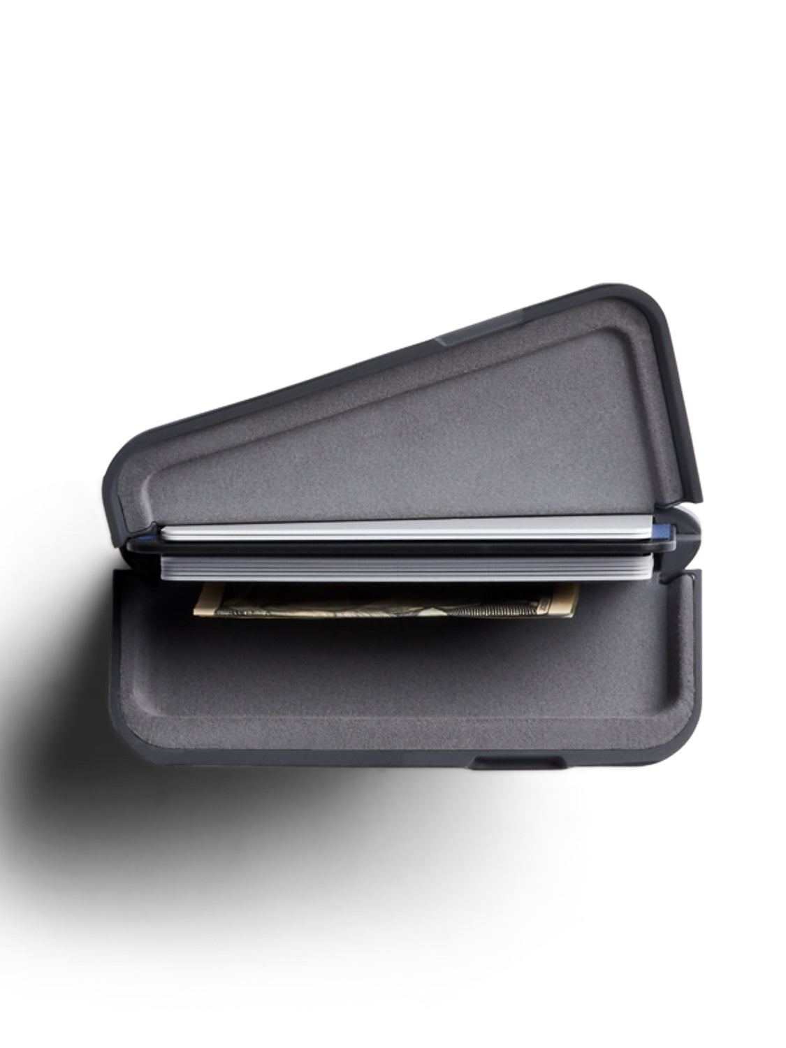 The Bellroy Flip Case Wallet, a minimalist black triangular design, is open to display cards in the top section and a folded bill below, all set against a white background.