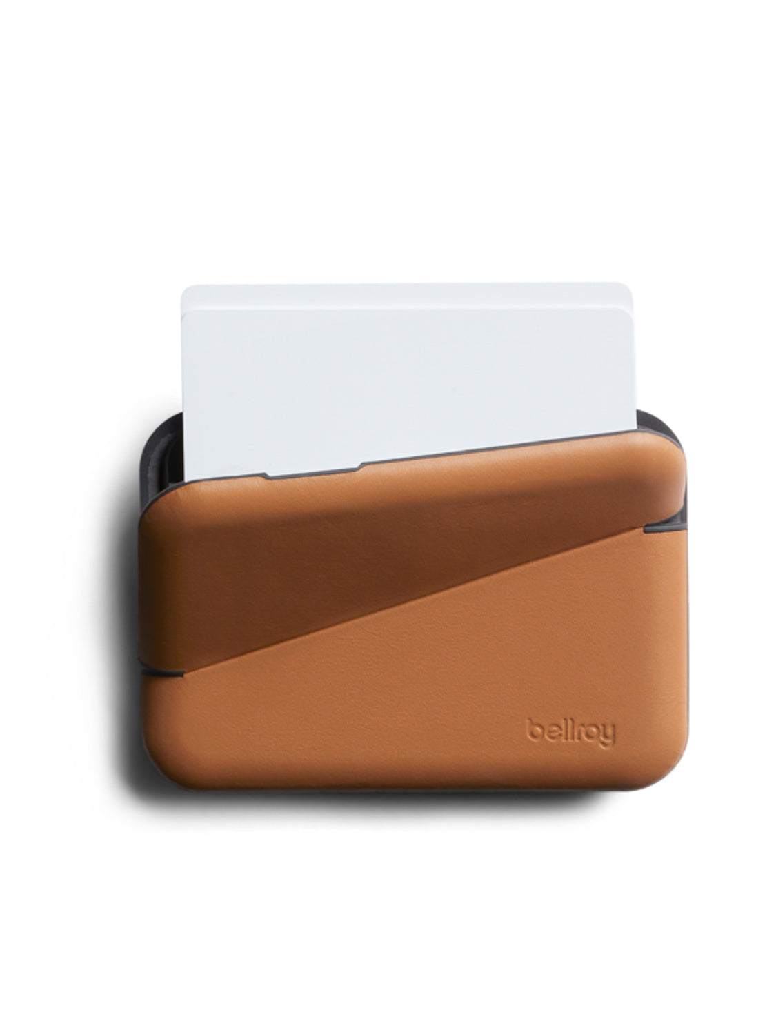 A brown eco-tanned leather Bellroy Flip Case Wallet is shown with a white card partially inserted, photographed against a white background.