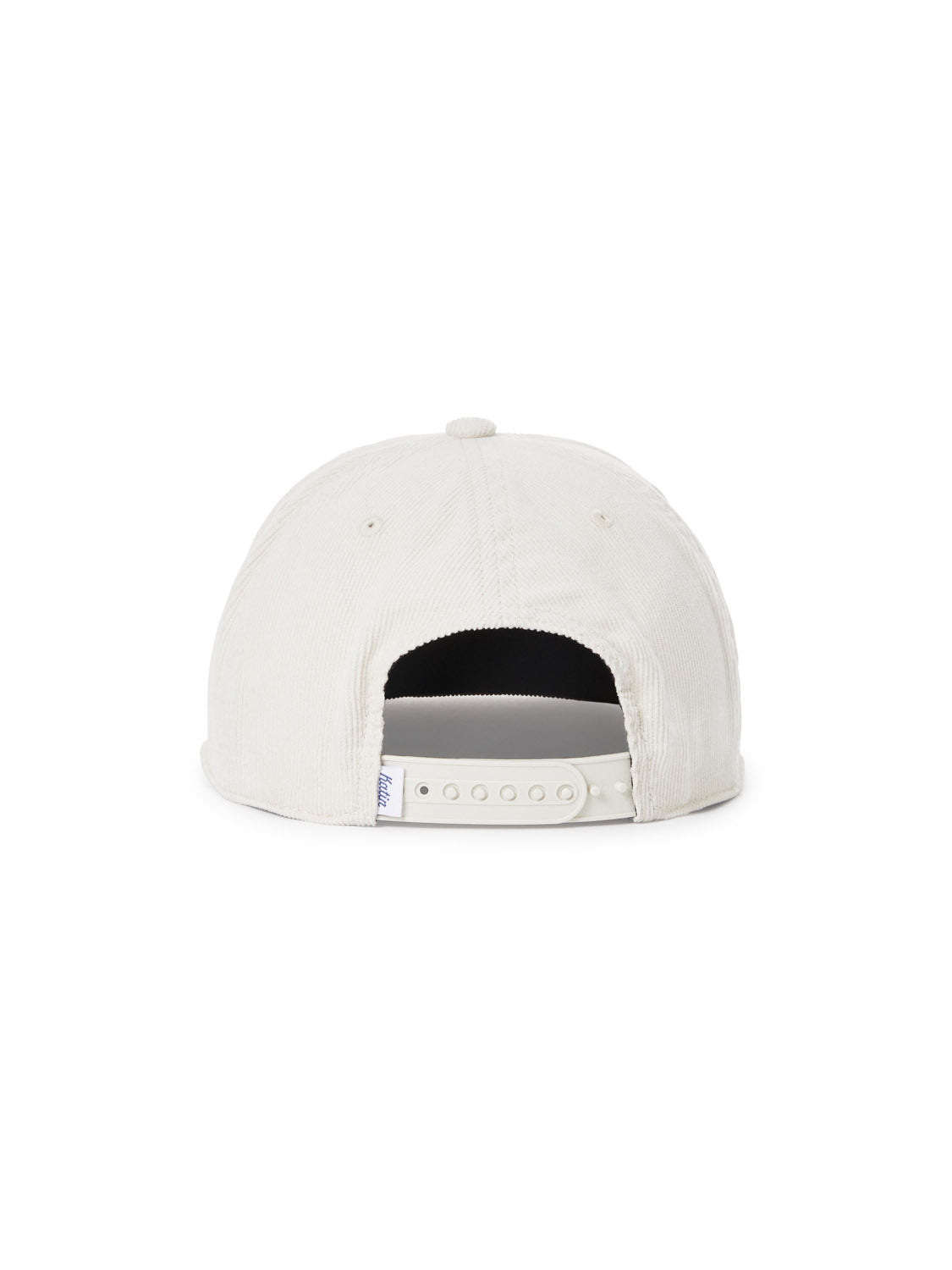 The image presents the reverse side of the white Katin Bermuda Hat, crafted from cotton corduroy with an adjustable strap and a small blue tag, all set against a plain white background.