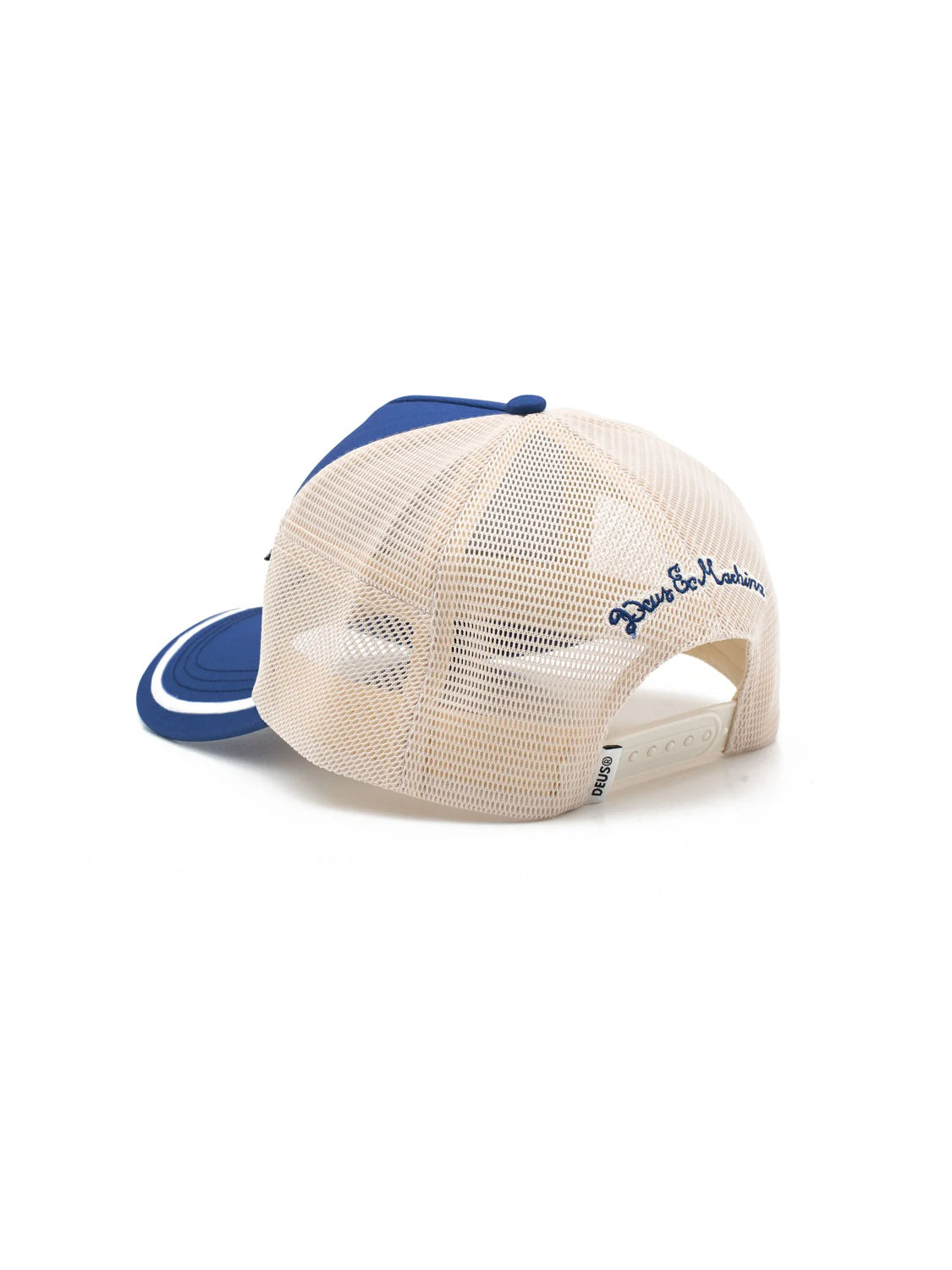 The Bills Trucker by Deus is a blue and white hat with a beige mesh back, snapback closure, and blue "Born to Wander" embroidery on the side. Shown with the back facing the camera.