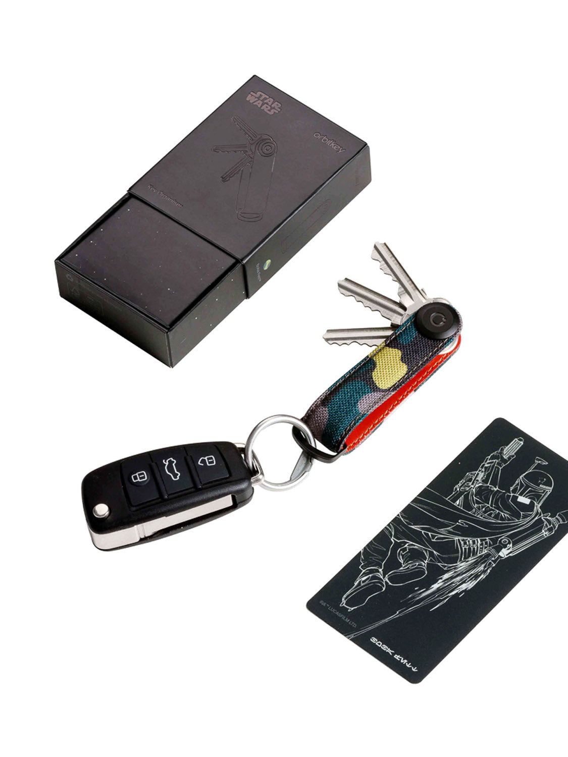 The Orbitkeys Star Wars Boba Fett Key Organizer includes a colorful holder, black car key, Star Wars keychain, themed box, and a card with Boba Fett line art, all shown on a white background.