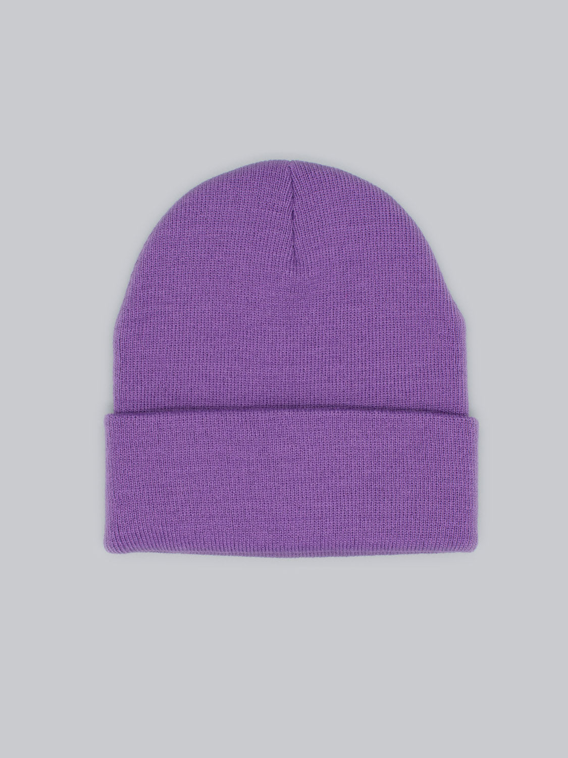 The Bronx Acrylic Beanie by ID Menswear, a stylish purple accessory with a folded brim, sits on a light gray background.
