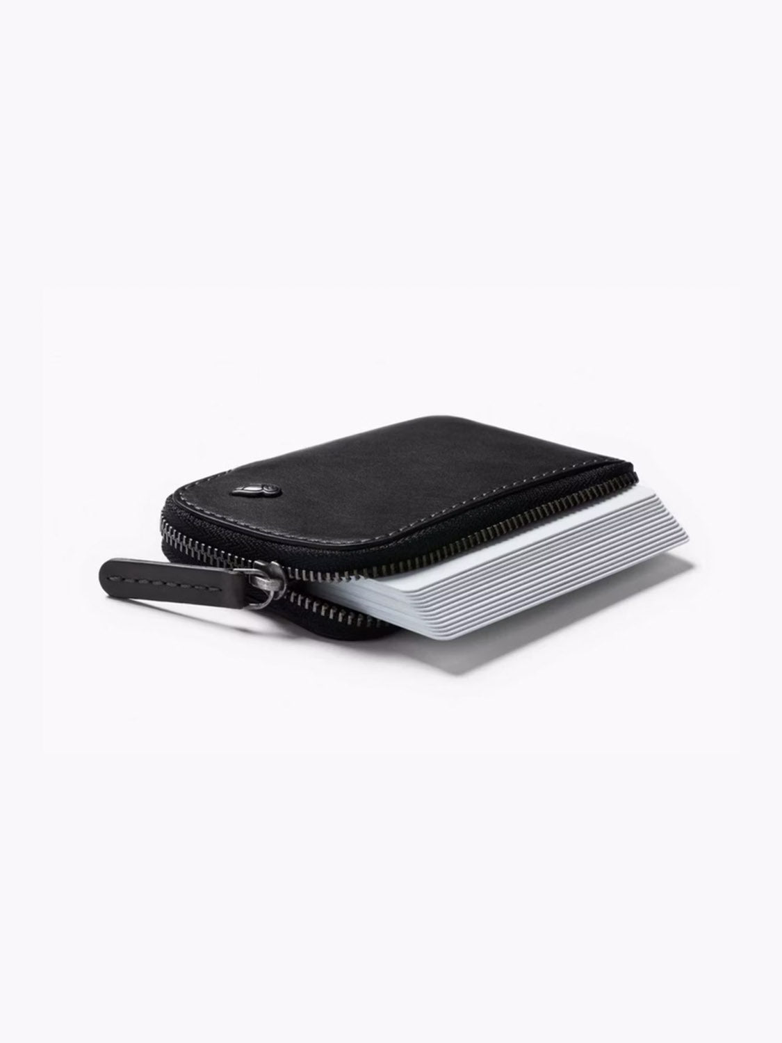 The Bellroy Card Pocket Wallet, shown partially open with a stack of cards visible inside, rests on a plain white background.
