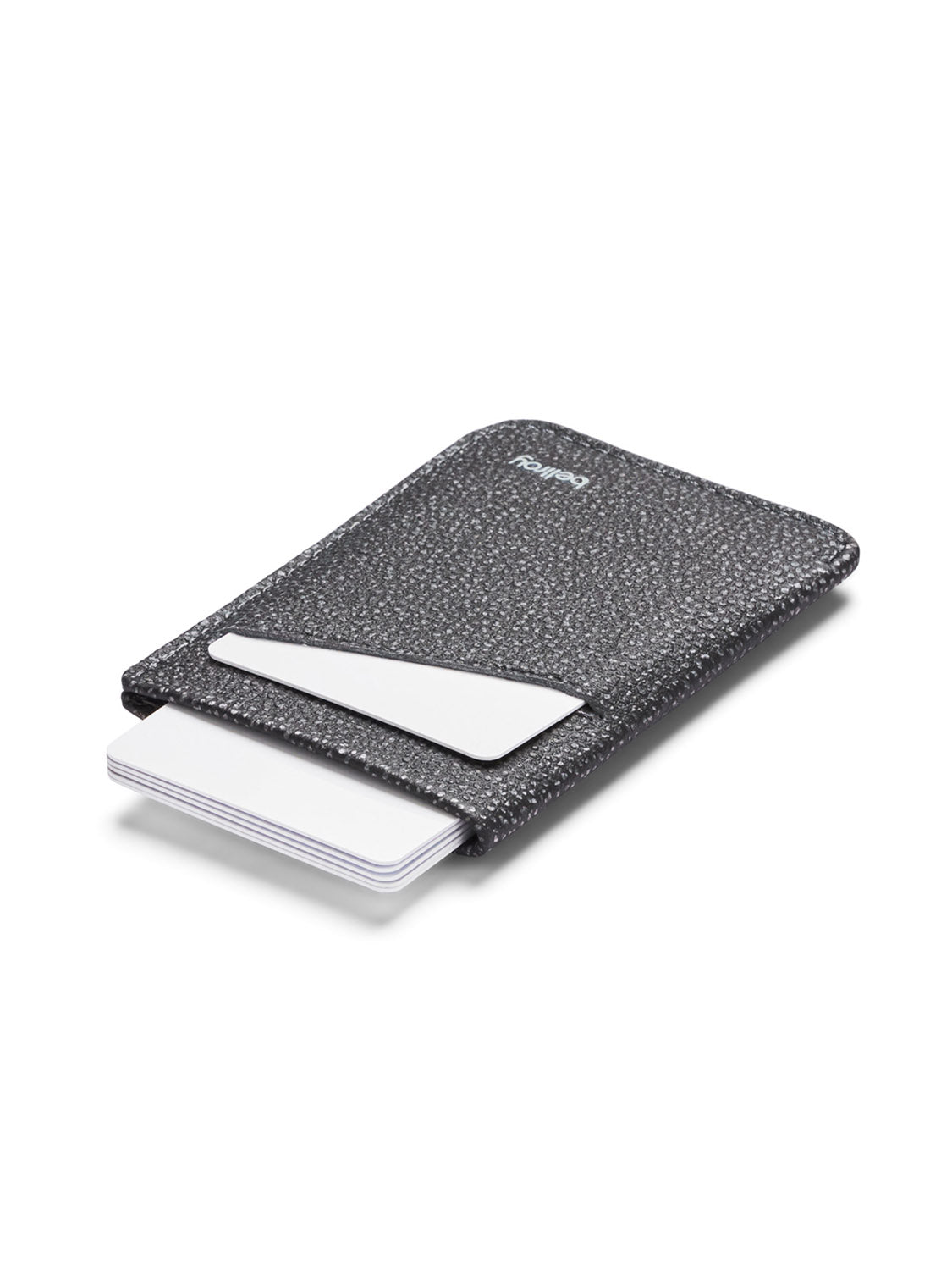 The Bellroy Card Sleeve Wallet, in speckled black and gray leather, is shown lying flat on a white background with white cards partially inserted.