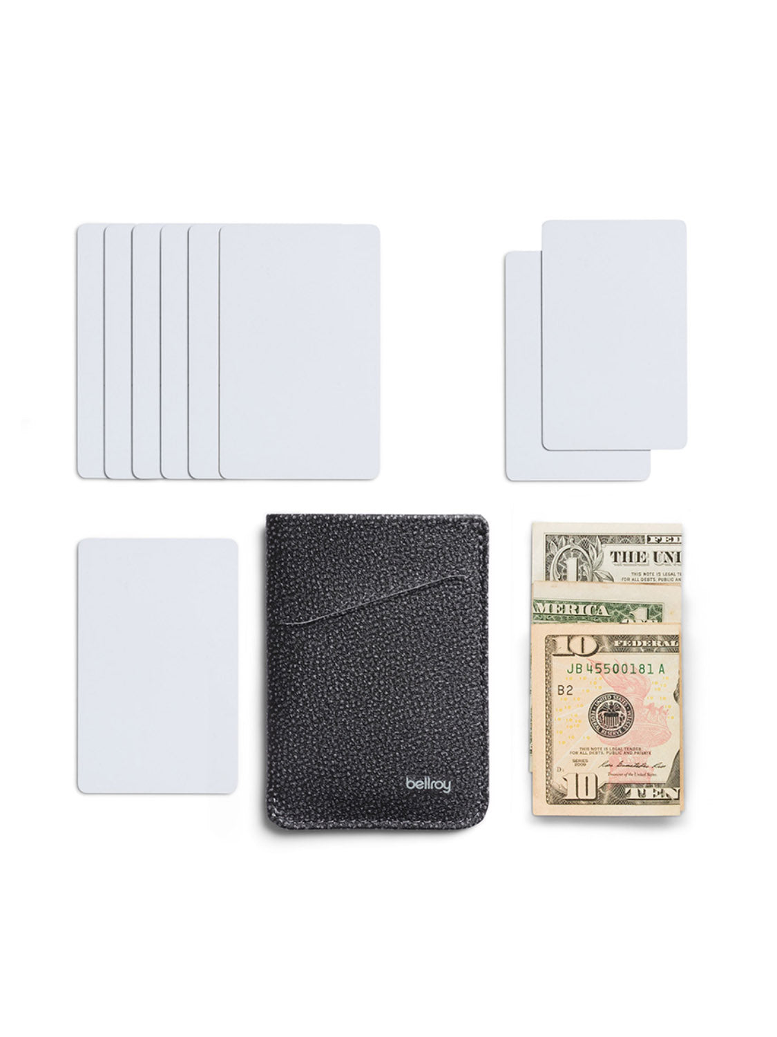 A black Bellroy Card Sleeve Wallet is shown on a white background with six blank cards, three folded dollar bills, and another blank card arranged around it.