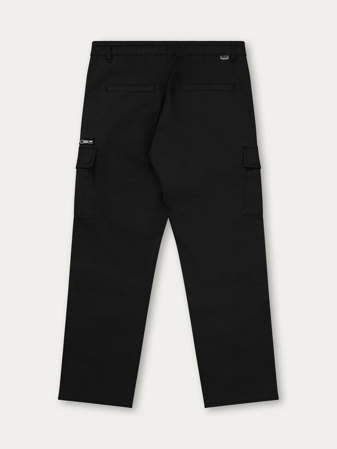 The Kuwalla Loose Cargo Trouser in black cotton is shown from the back, featuring two back pockets, side cargo pockets with flaps, and straight legs, laid flat against a light background.