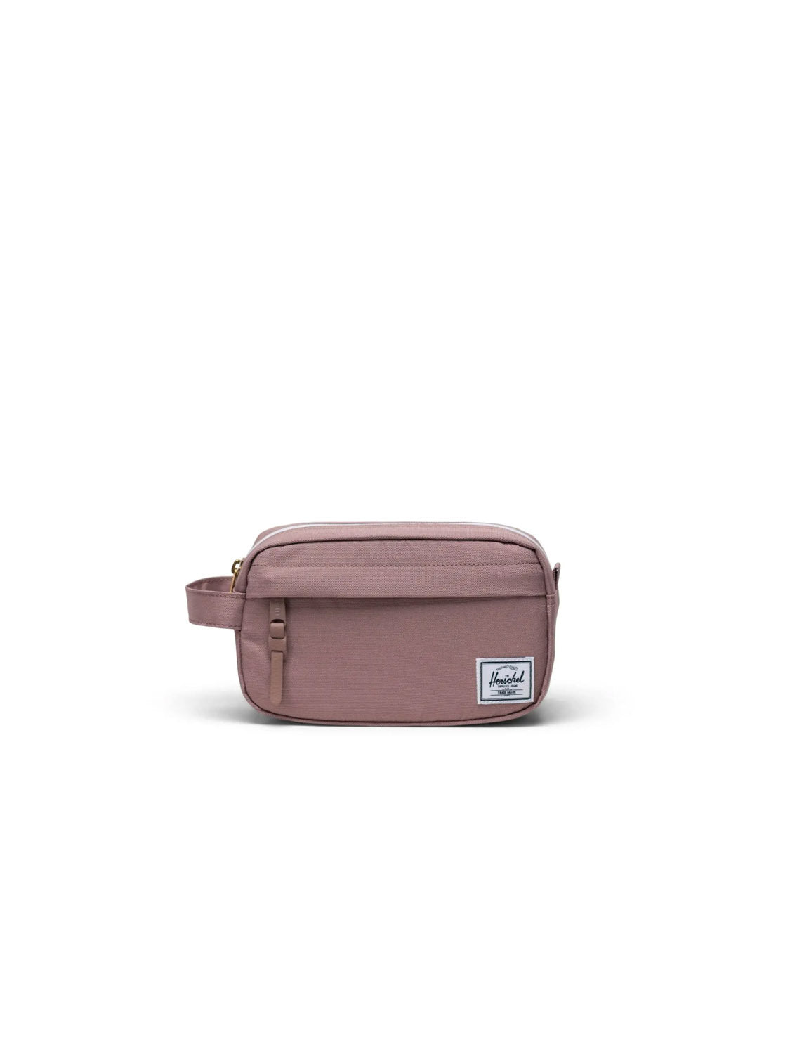 The Herschel Chapter Small Travel Kit is a compact, rectangular mauve toiletry bag made from recycled fabric, featuring a side handle, gold zipper, front pocket, and a white brand logo on the bottom right corner against a white background.