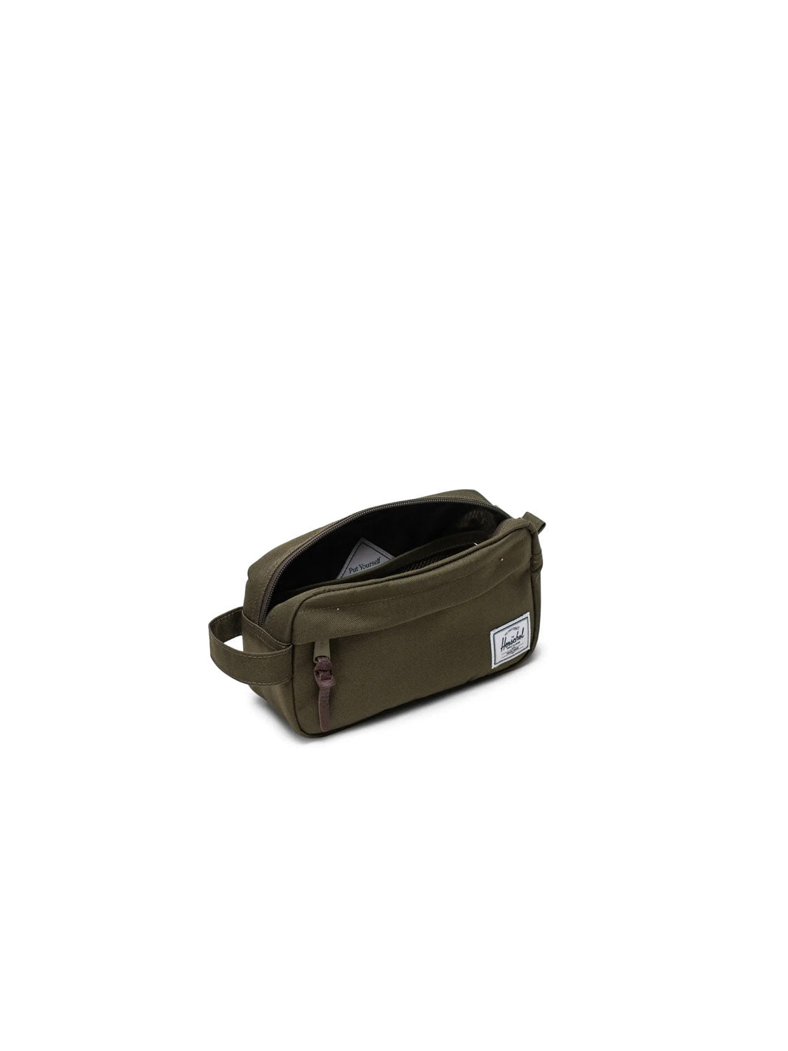 The Herschel Chapter Small Travel Kit is an olive green rectangular toiletry bag made from recycled fabric, with a zipper, side handle, and white logo patch. Its spacious lined interior makes it perfect as your travel organizer.