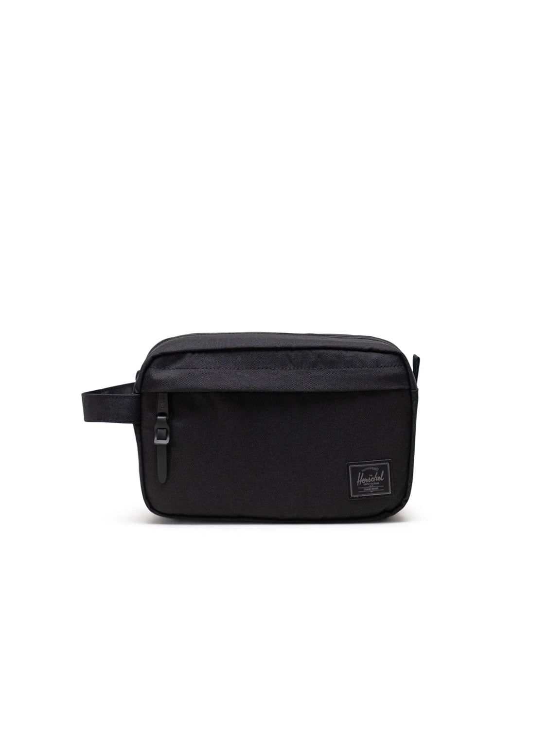 The Herschel Chapter Travel Kit is a black rectangular bag featuring a waterproof zipper, small side handle, and a logo patch on the lower right corner. Perfect as an organizer or travel kit, it's shown against a plain white background.