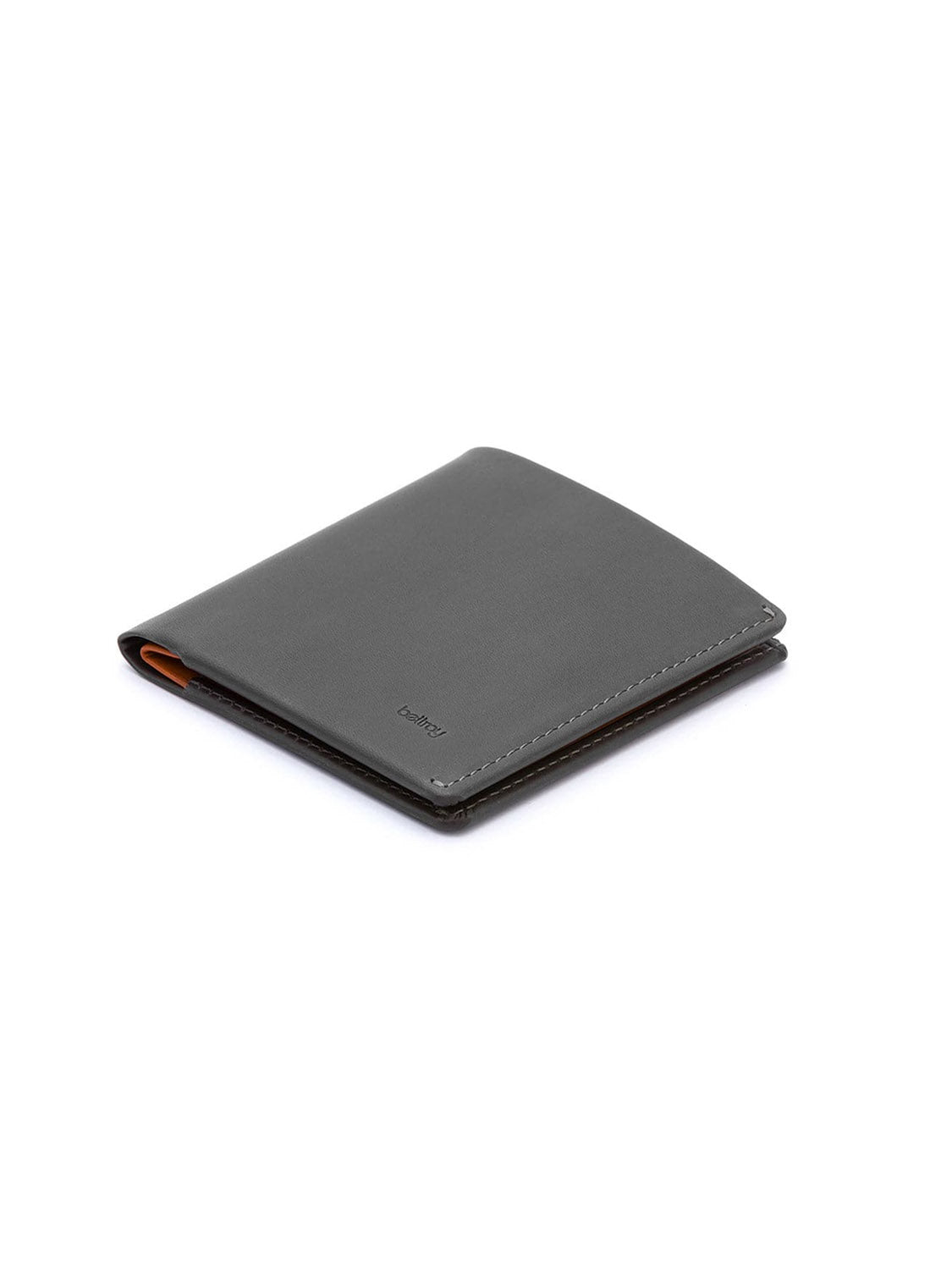 The Bellroy Note Sleeve Wallet by Bellroy is a minimalist black premium leather wallet, shown closed and angled on a white background, featuring a small embossed logo at the lower edge and built-in RFID protection for security.