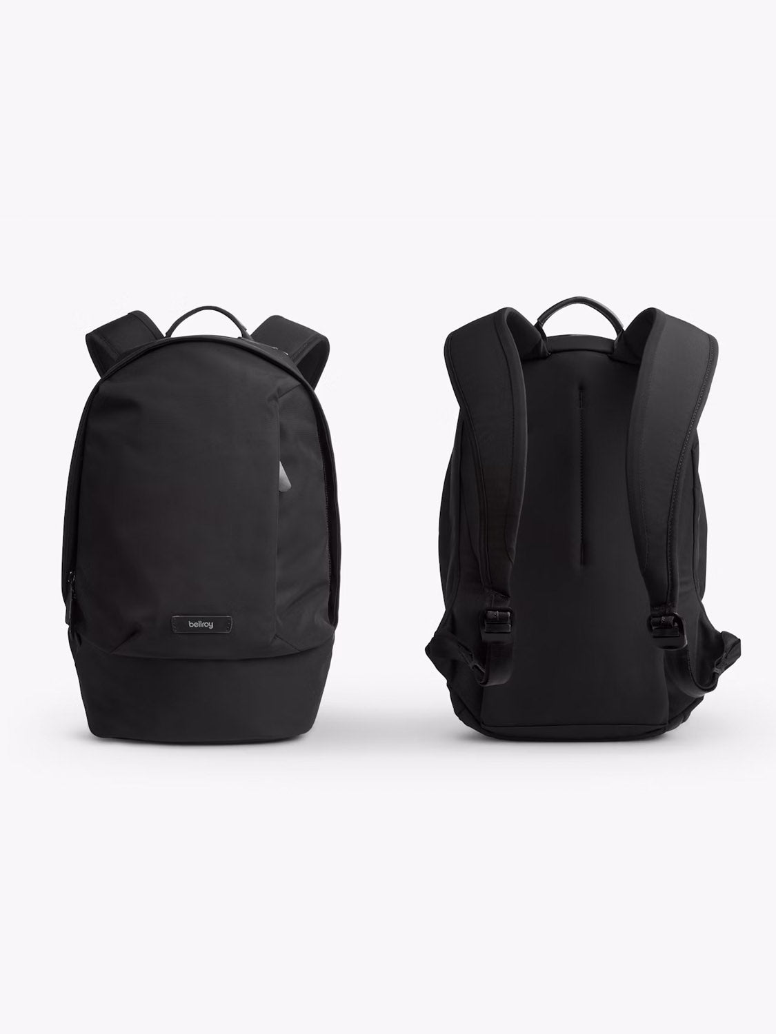 Two Bellroy Classic Compact Backpacks (16L) in black are shown side by side on a white background, one displaying the front and the other showing the padded shoulder straps and top handle.