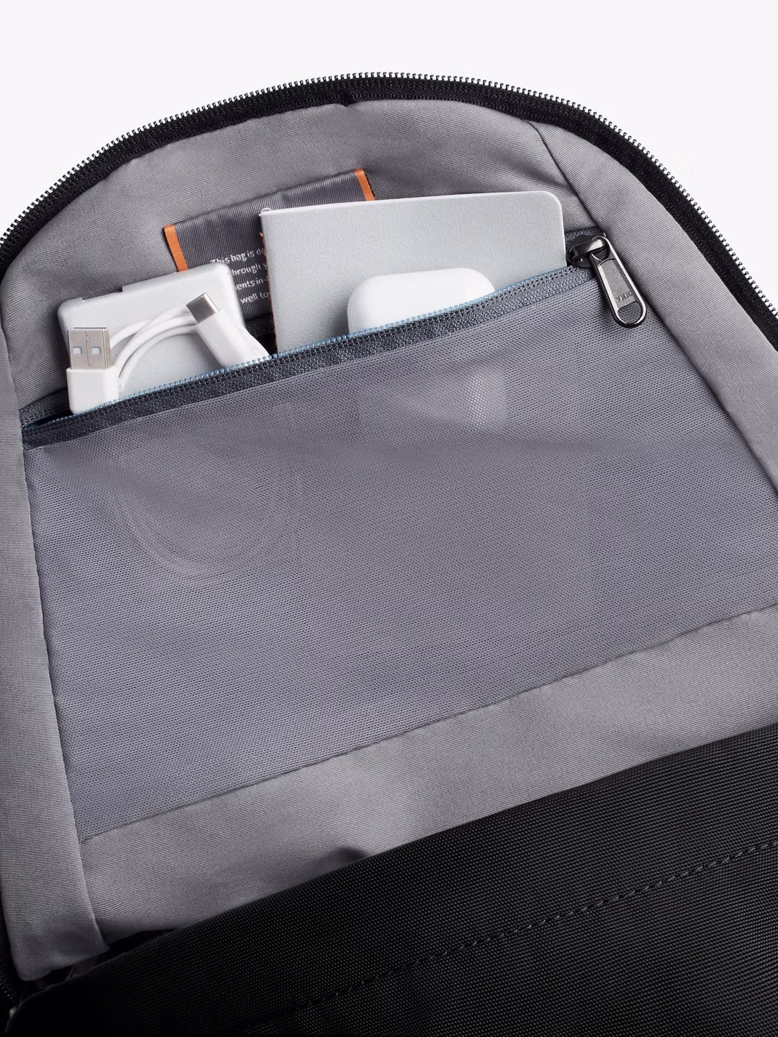 The Bellroy Classic Compact Backpack 16L is water-resistant and features multiple electronic pockets plus a sleeve for a 13-inch laptop.