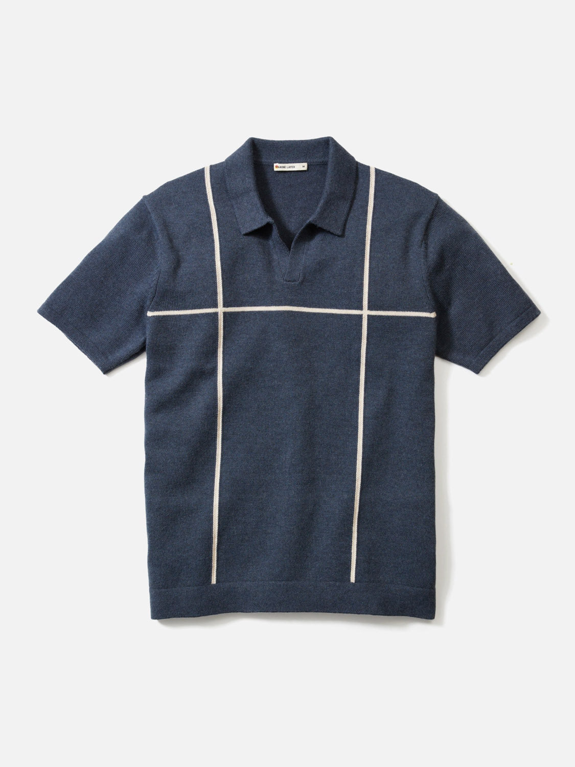 The Cliff Sweater Polo by Marine Layer is a short-sleeve, navy knit polo with a collar and a cream grid pattern on the front, made from a comfortable cotton-nylon-wool blend.