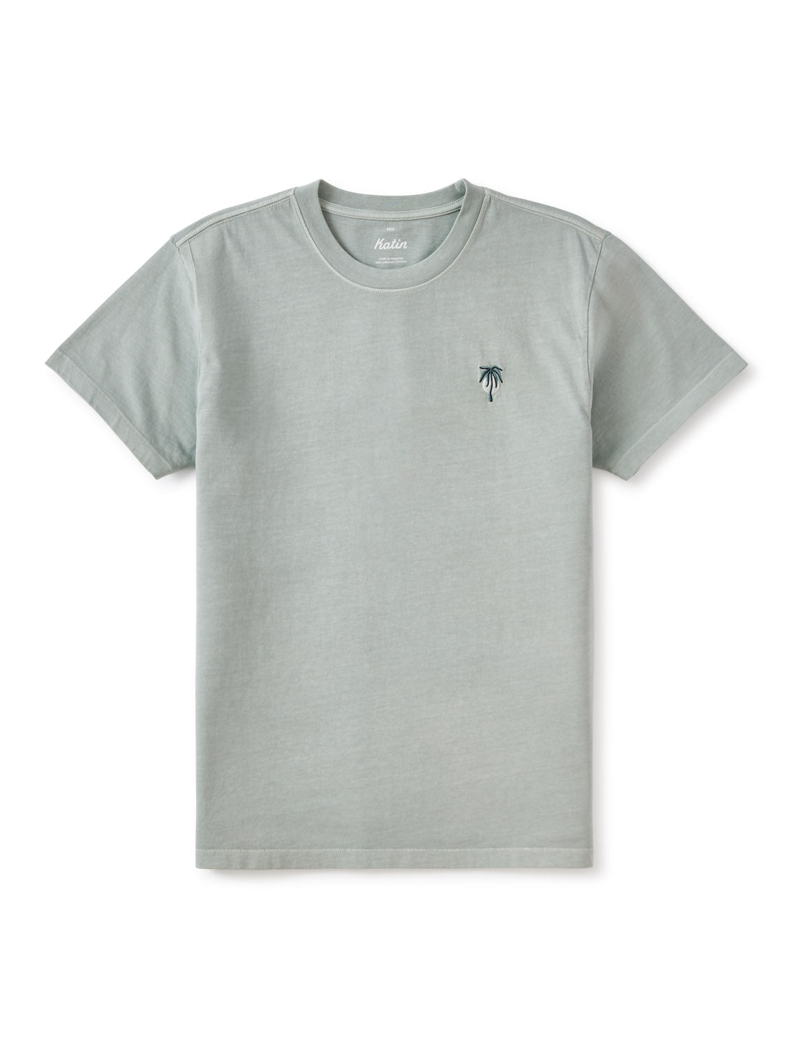 The Katin Crawford Embroidered Tee by Katin is a light gray, organic cotton T-shirt with short sleeves and a round neckline. It features a small embroidered palm tree on the left chest, showcased on a plain white background.